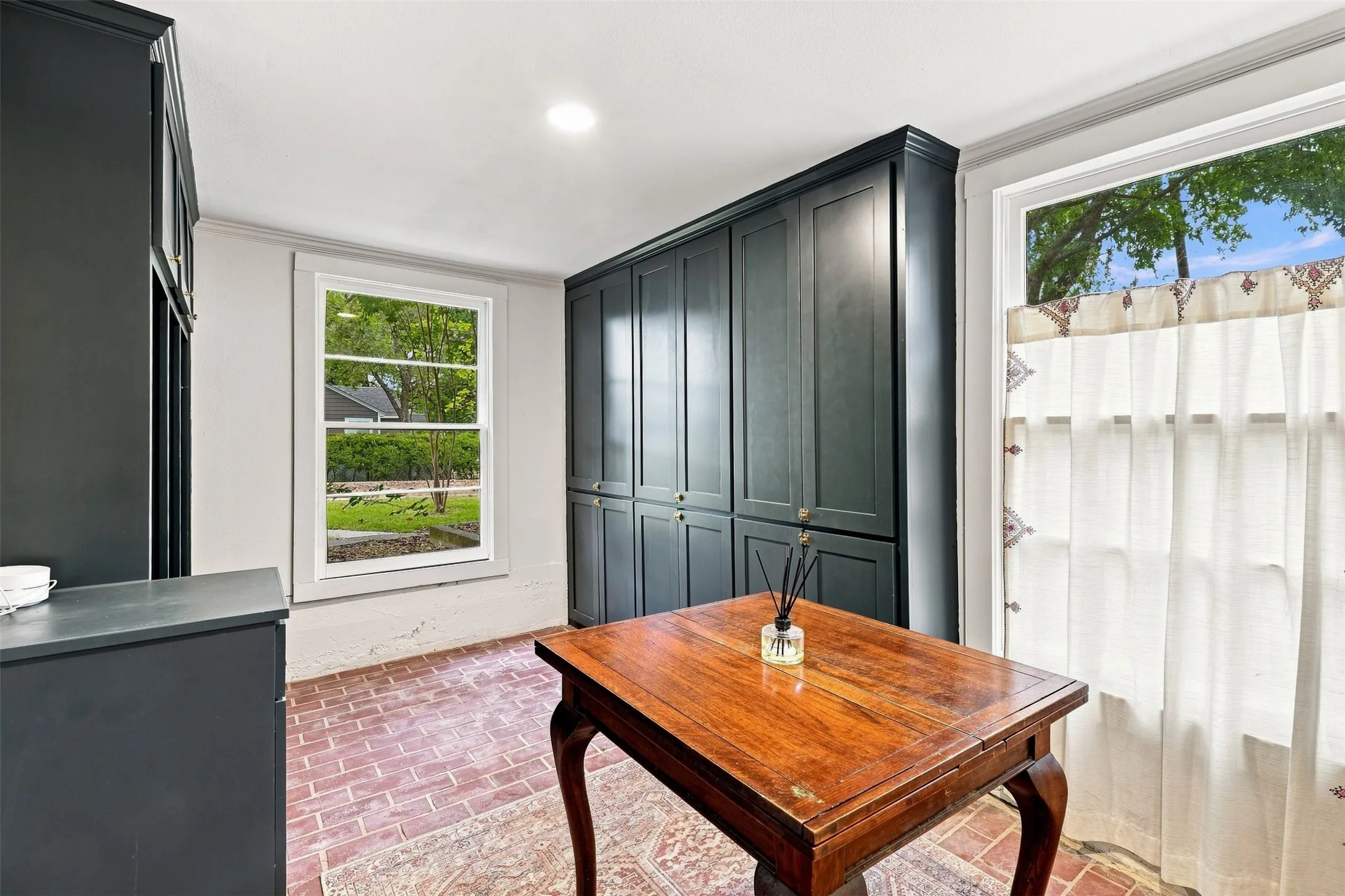 Even laundry day feels a little more luxurious in this thoughtfully designed lower level space complete with built in storage.