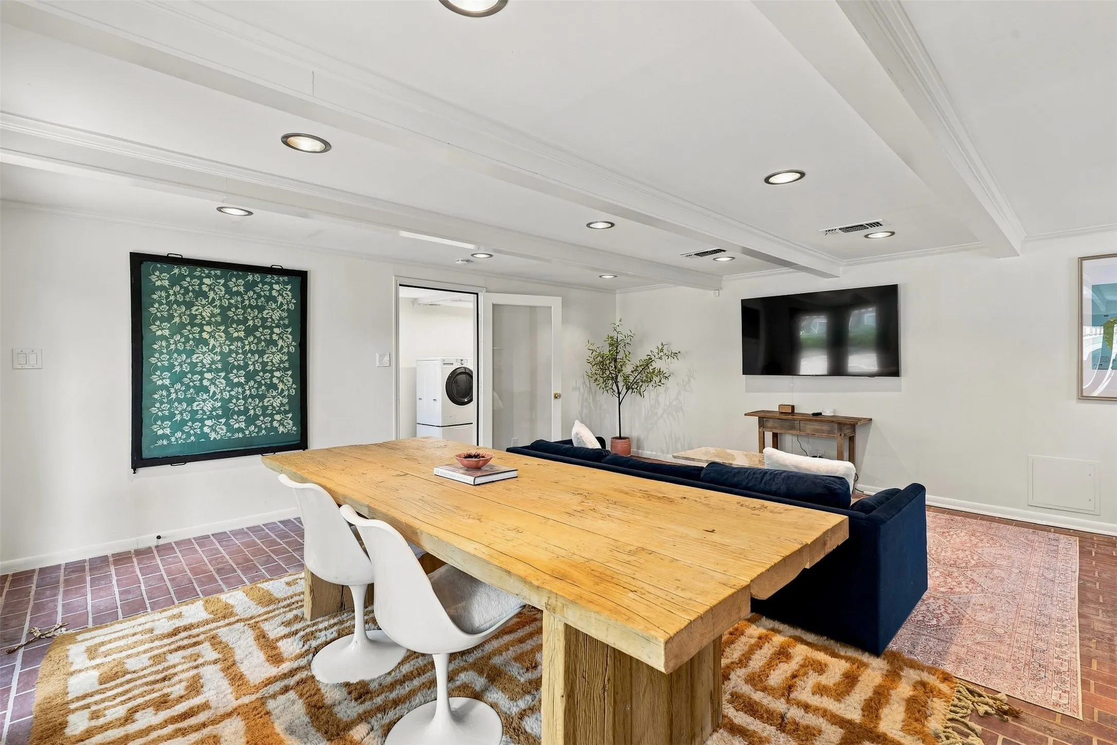A tucked away with rear entry office sits in the basement area for a quiet relaxing place to create with easy access to the backyard nature area