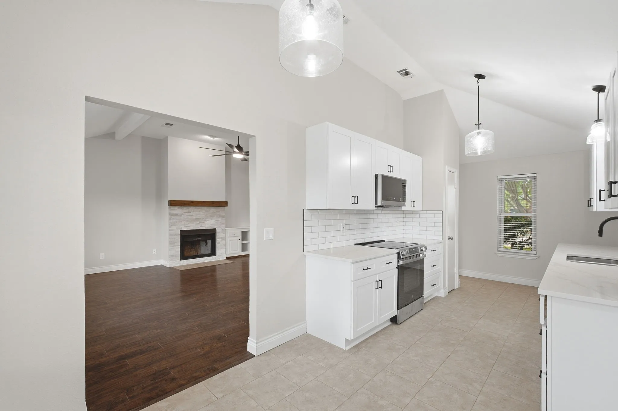 View from breakfast area toward Kitchen and Living Room.