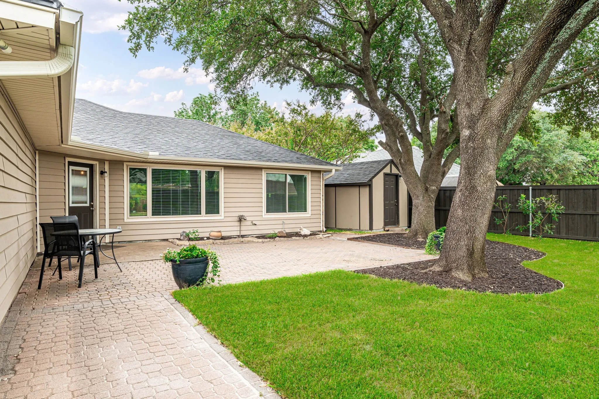 Mature trees that give great shade on the extended patio.