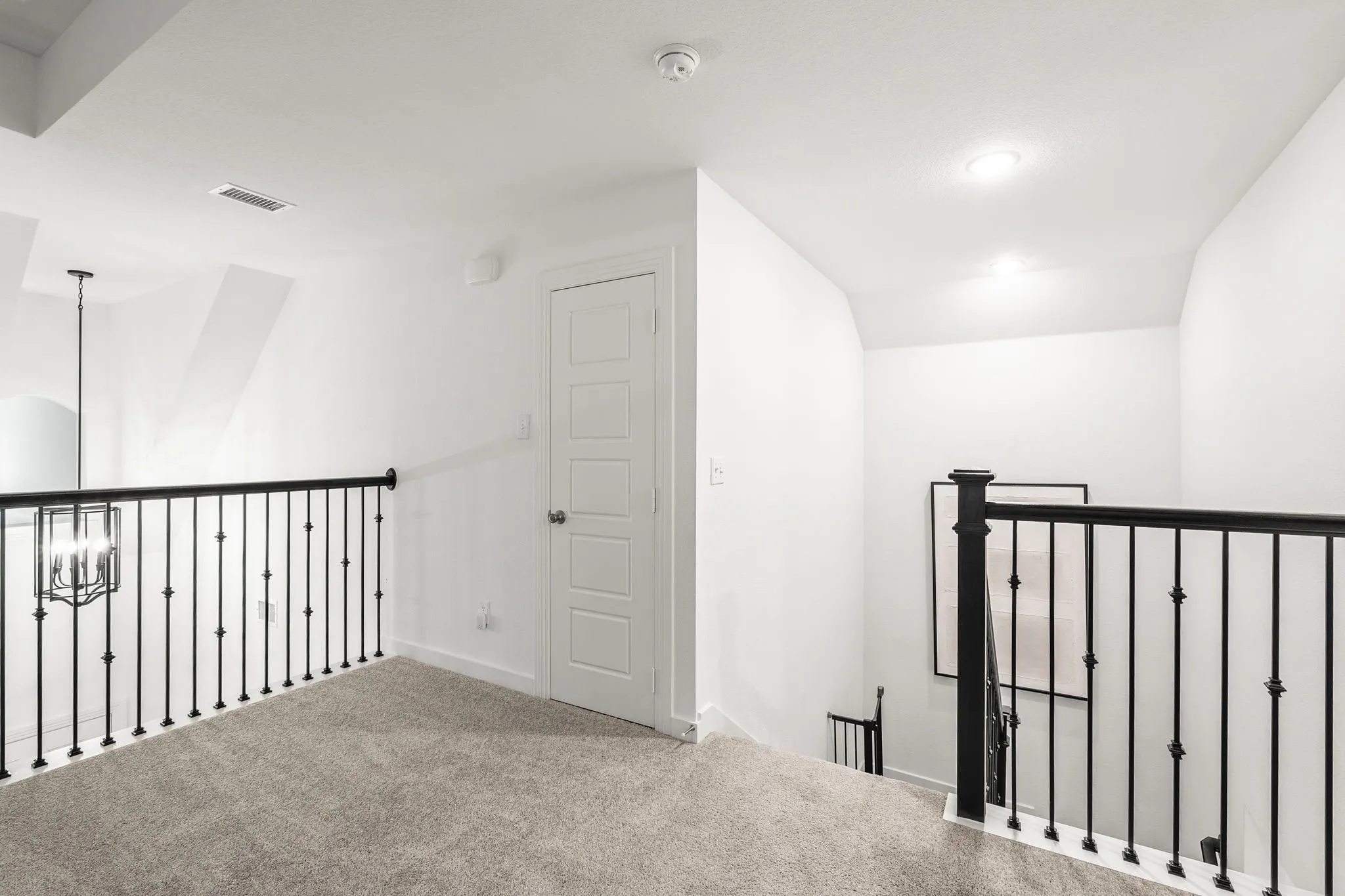 Note the handsome wrought iron spindles.