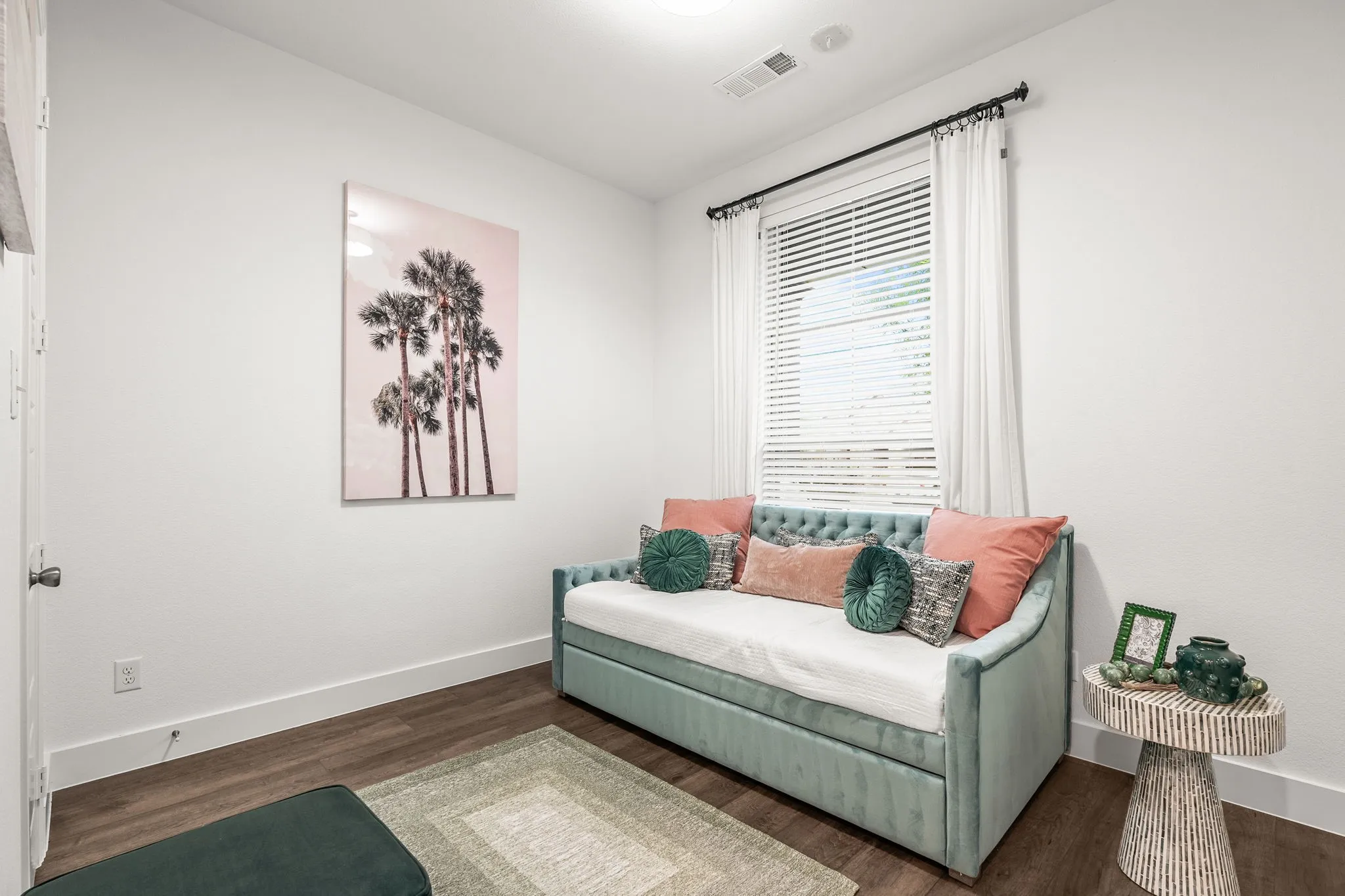 Secondary bedroom on first level near full bath.