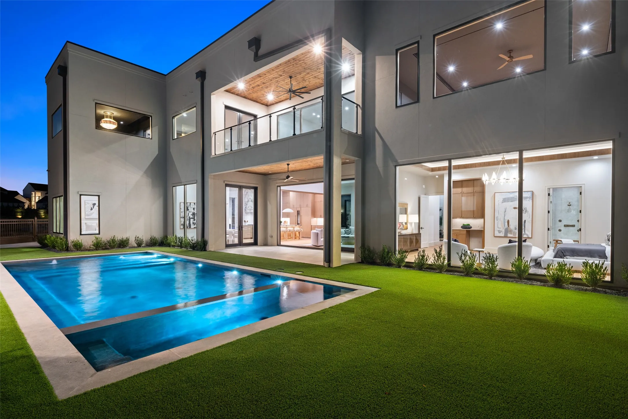 Contemporary exterior with a swimming pool and integrated spa