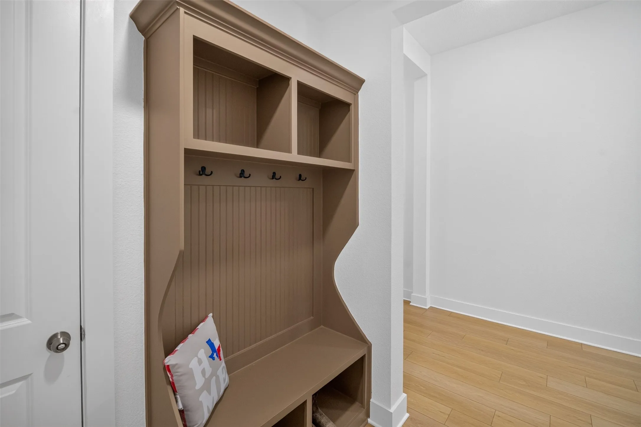 Built-in mudroom bench with cubbies and coat hooks