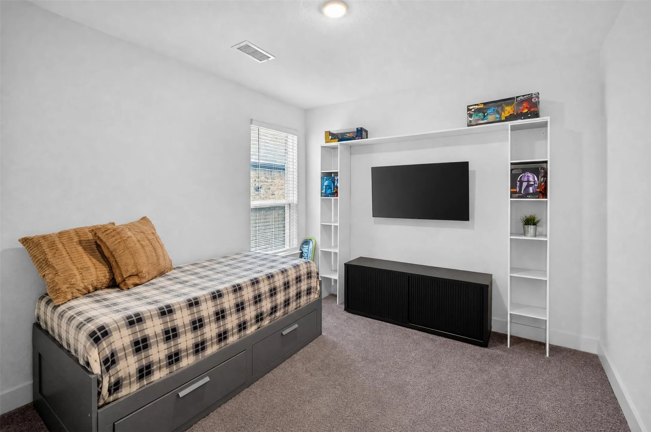 Built-in shelving unit with integrated media console