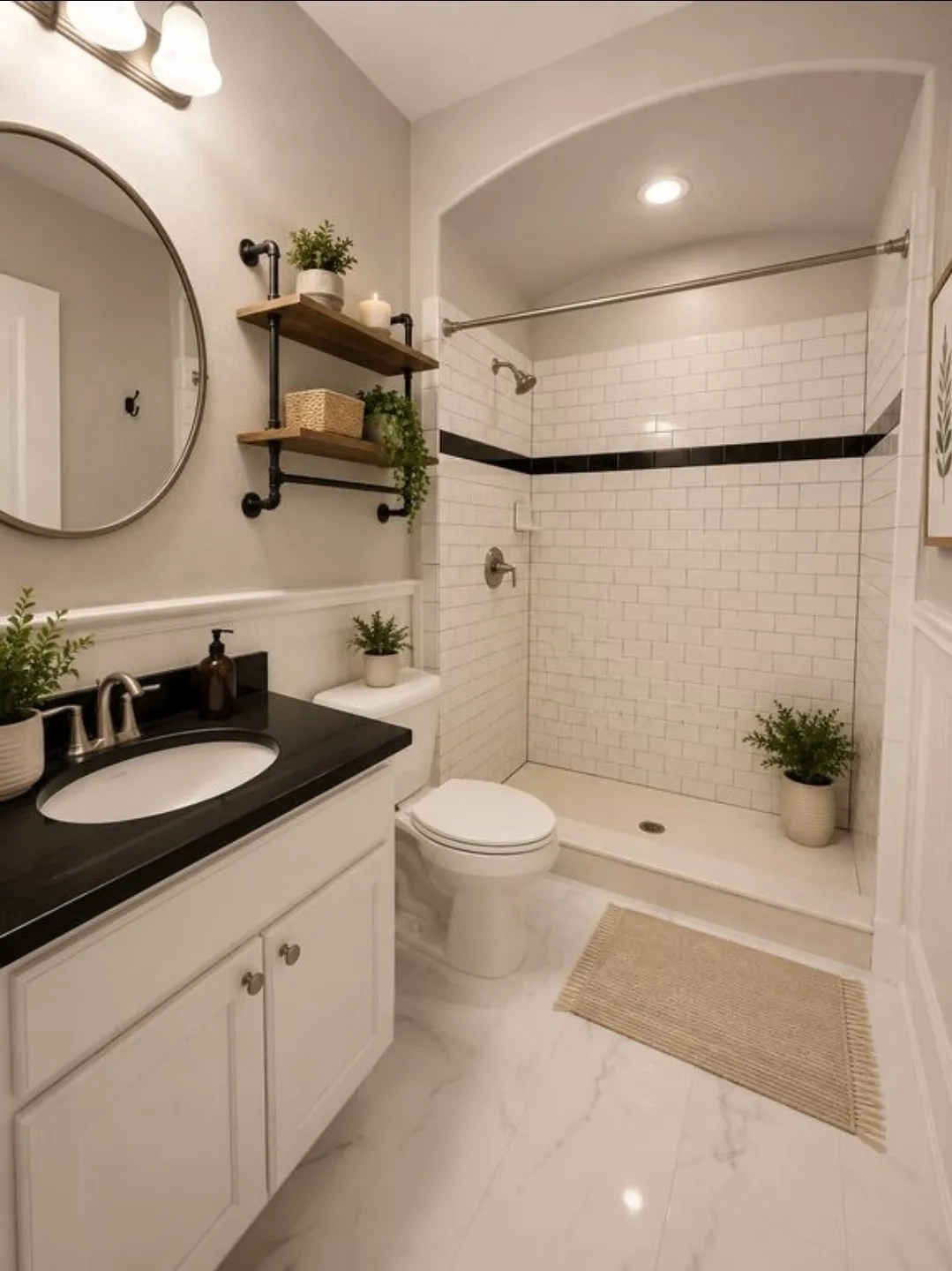 White shaker-style vanity with a dark countertop and undermount sink
