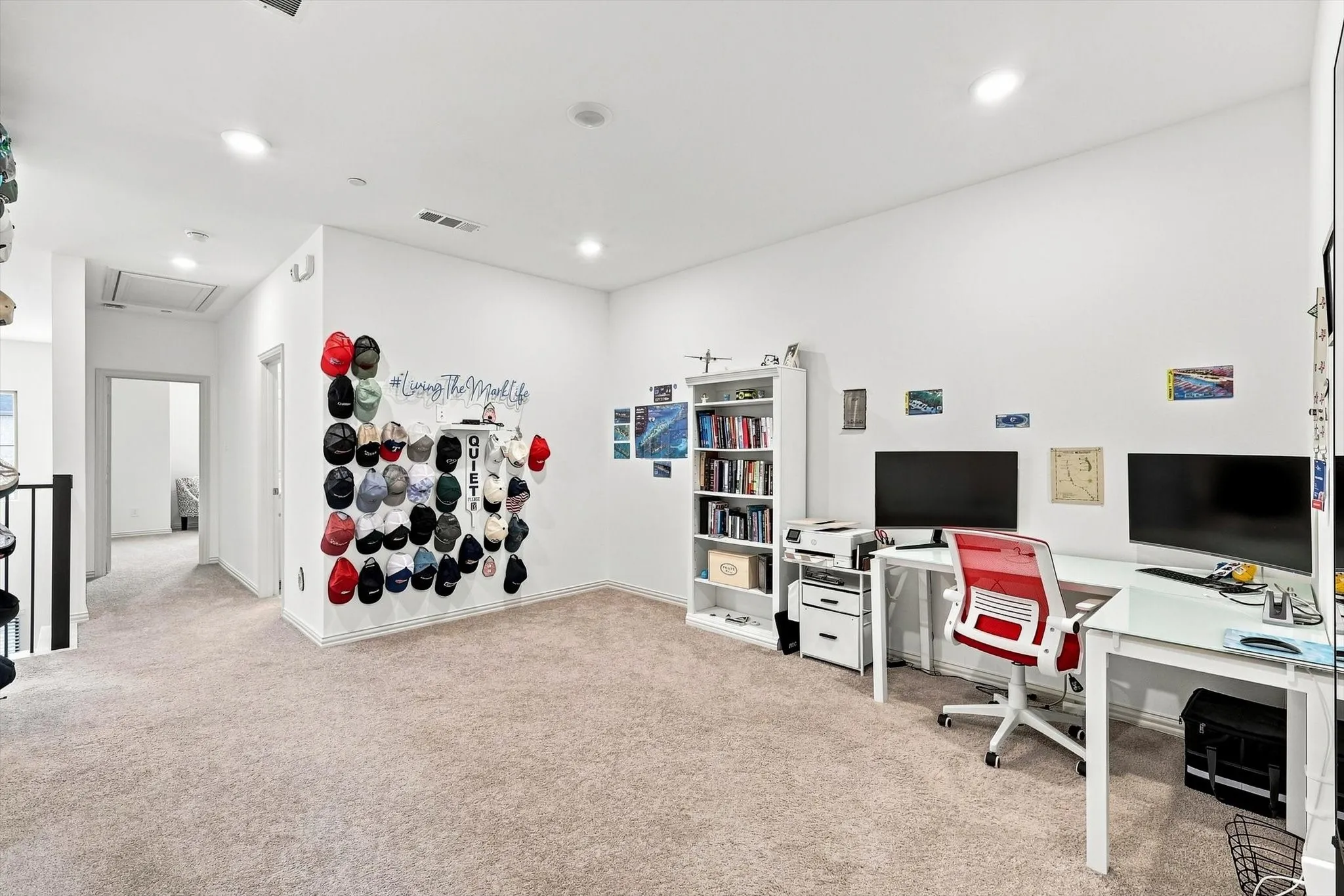 A spacious second living area with room for multiple workstations, lounge furniture, or entertainment setups makes this home exceptionally versatile.