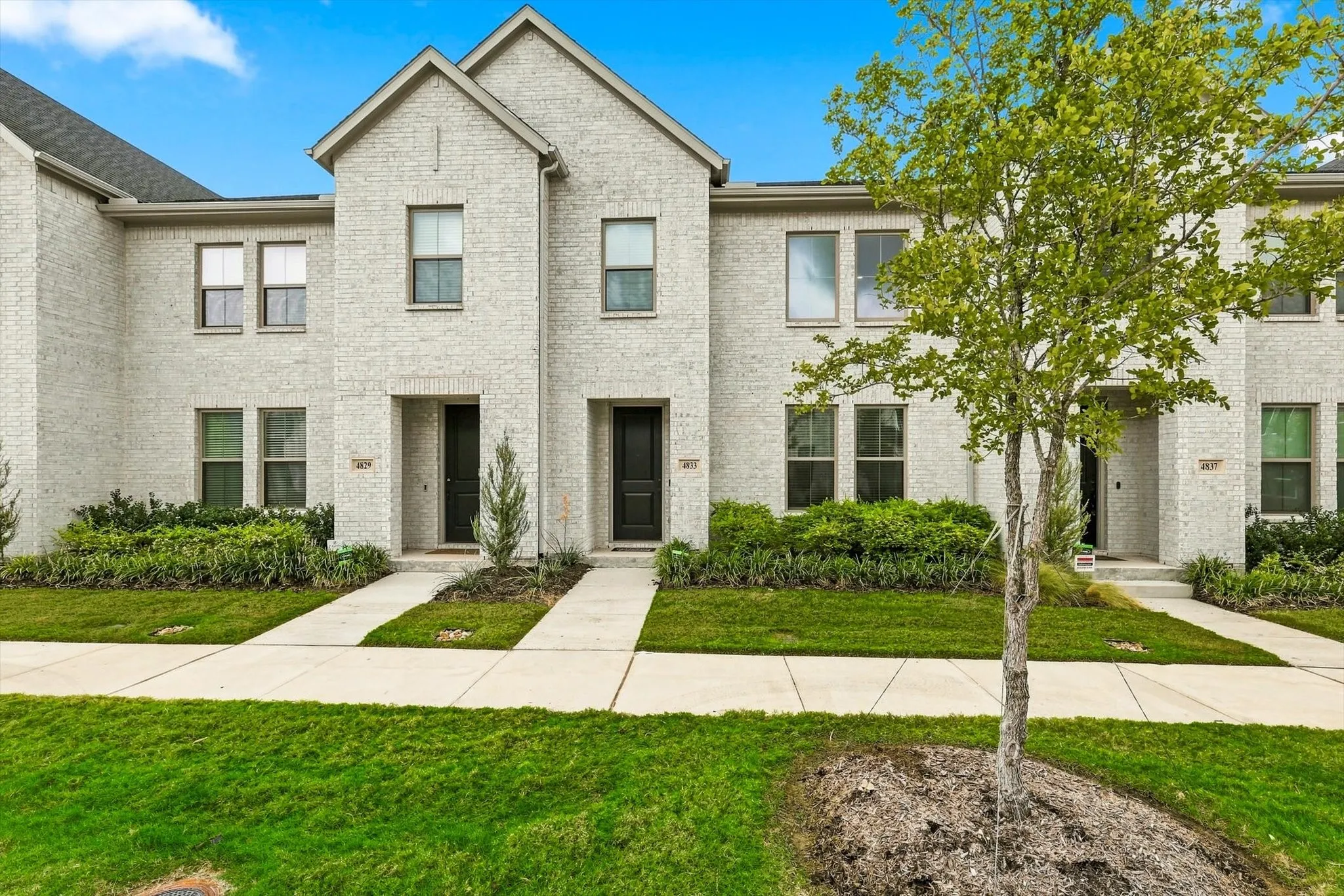 A standout exterior with dramatic rooflines, manicured greenery, and the polished curb appeal today’s buyers love.