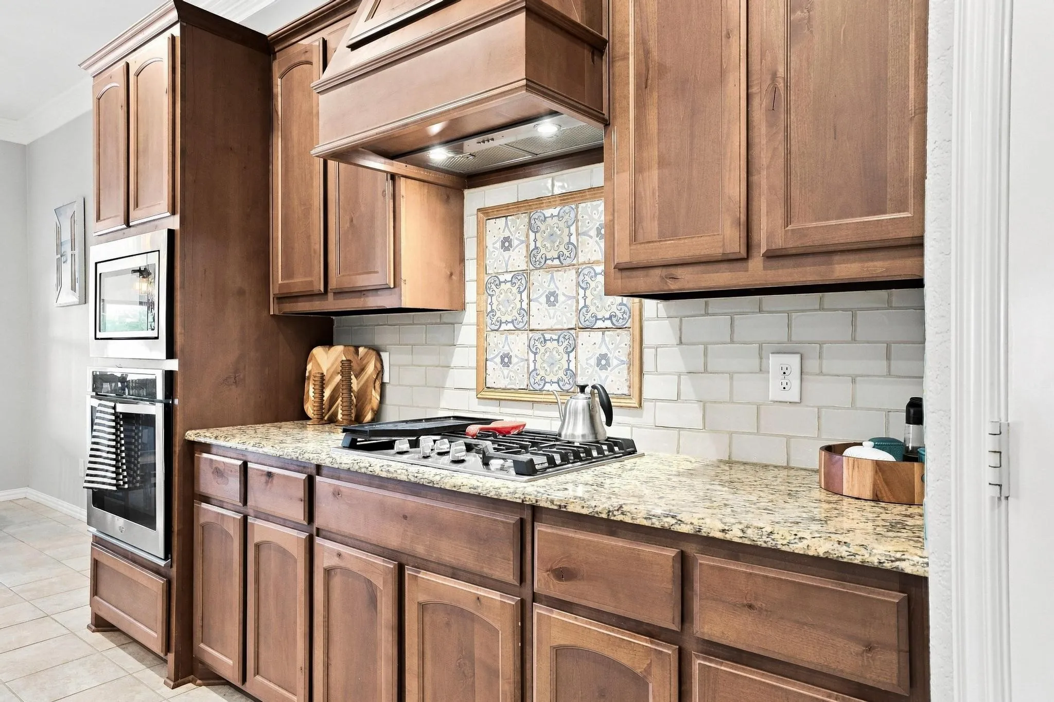  Entertainment! Gas Stovetop with Griddle, Huge Island, Warm Wood Cabinetry, Walk In Pantry.