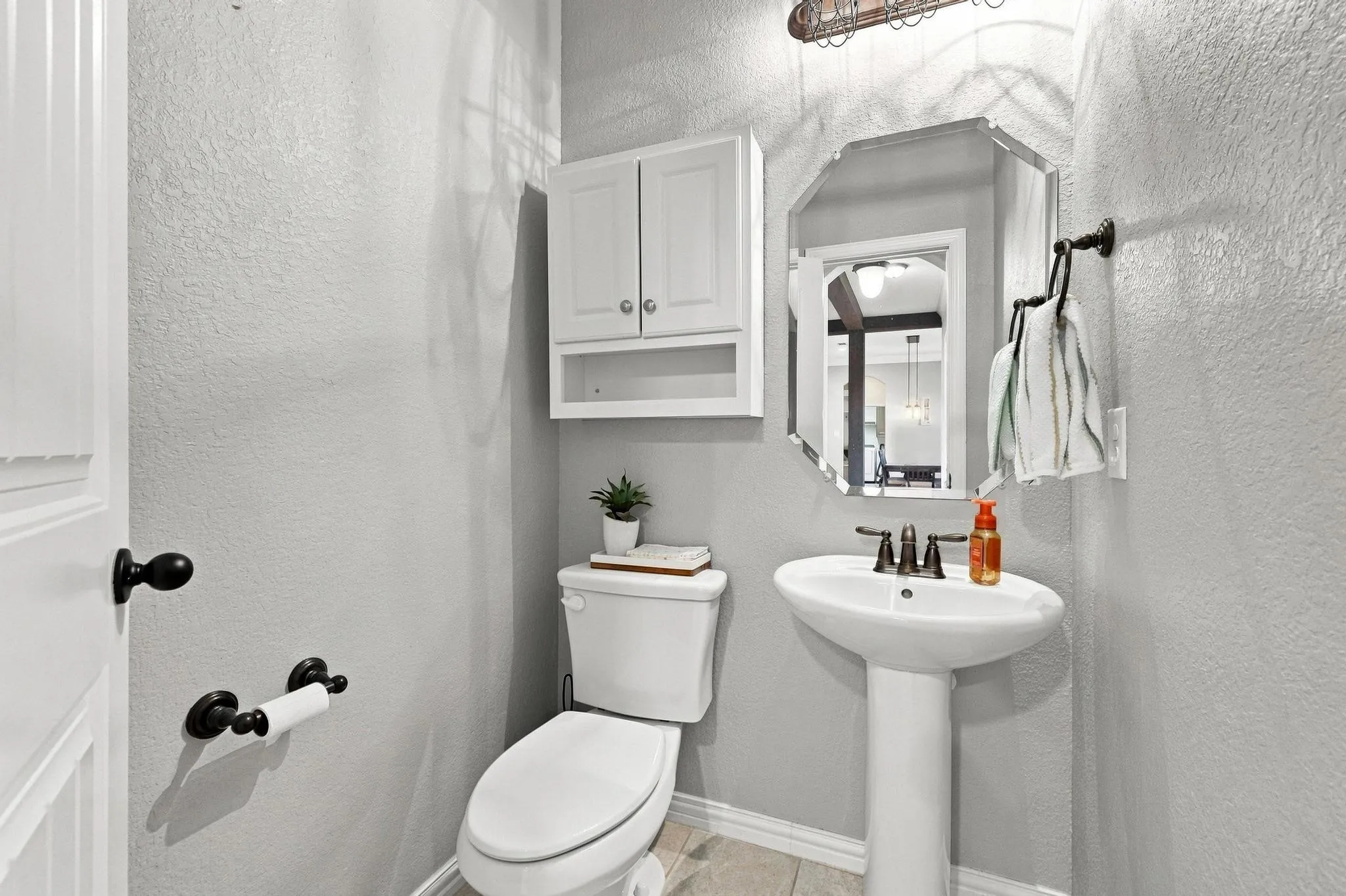 Cute Powder Room just off Gameroom and Perfect for your Pool Guests