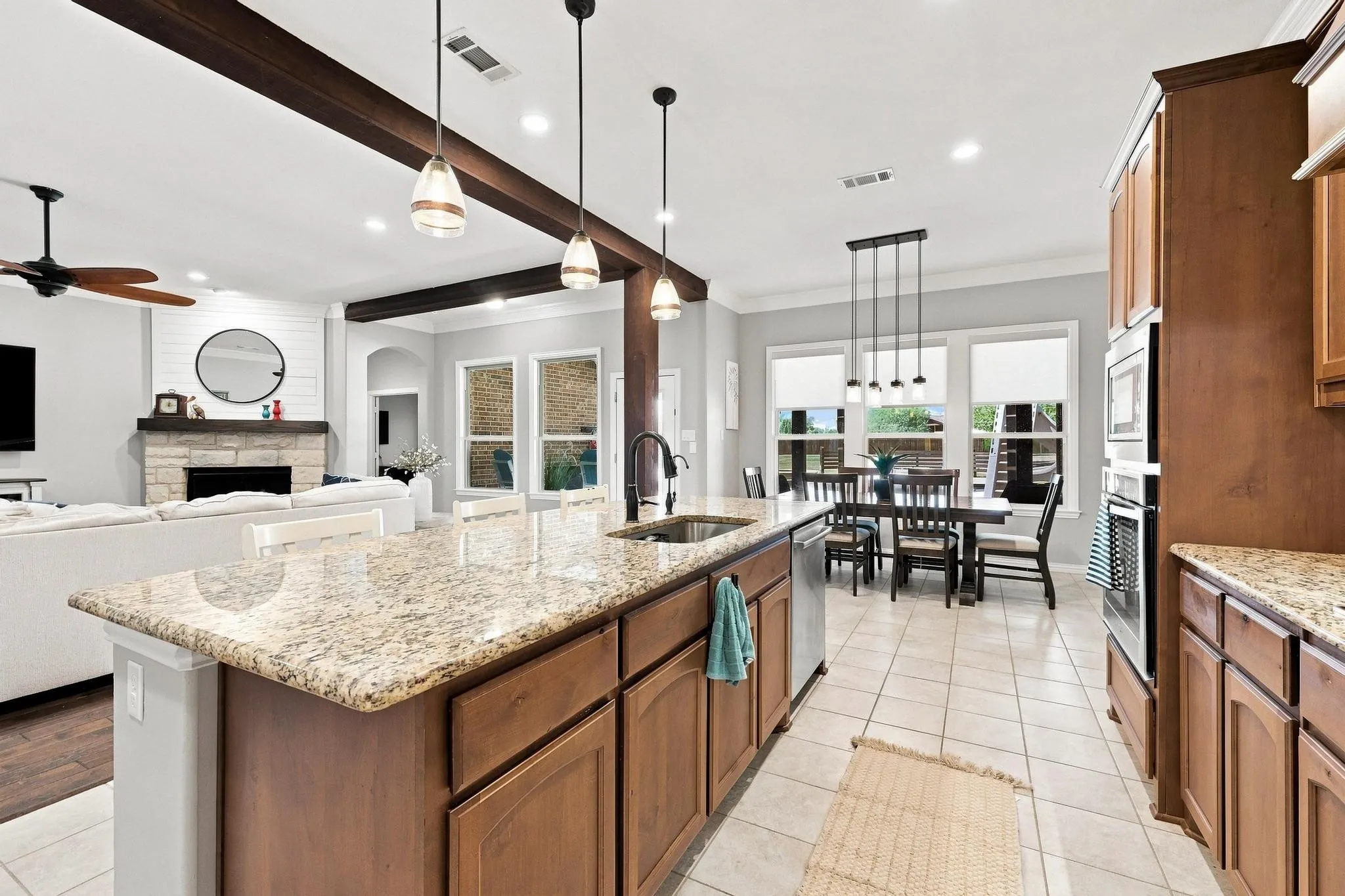  Entertainment! Gas Stovetop with Griddle, Huge Island, Warm Wood Cabinetry, Walk In Pantry.