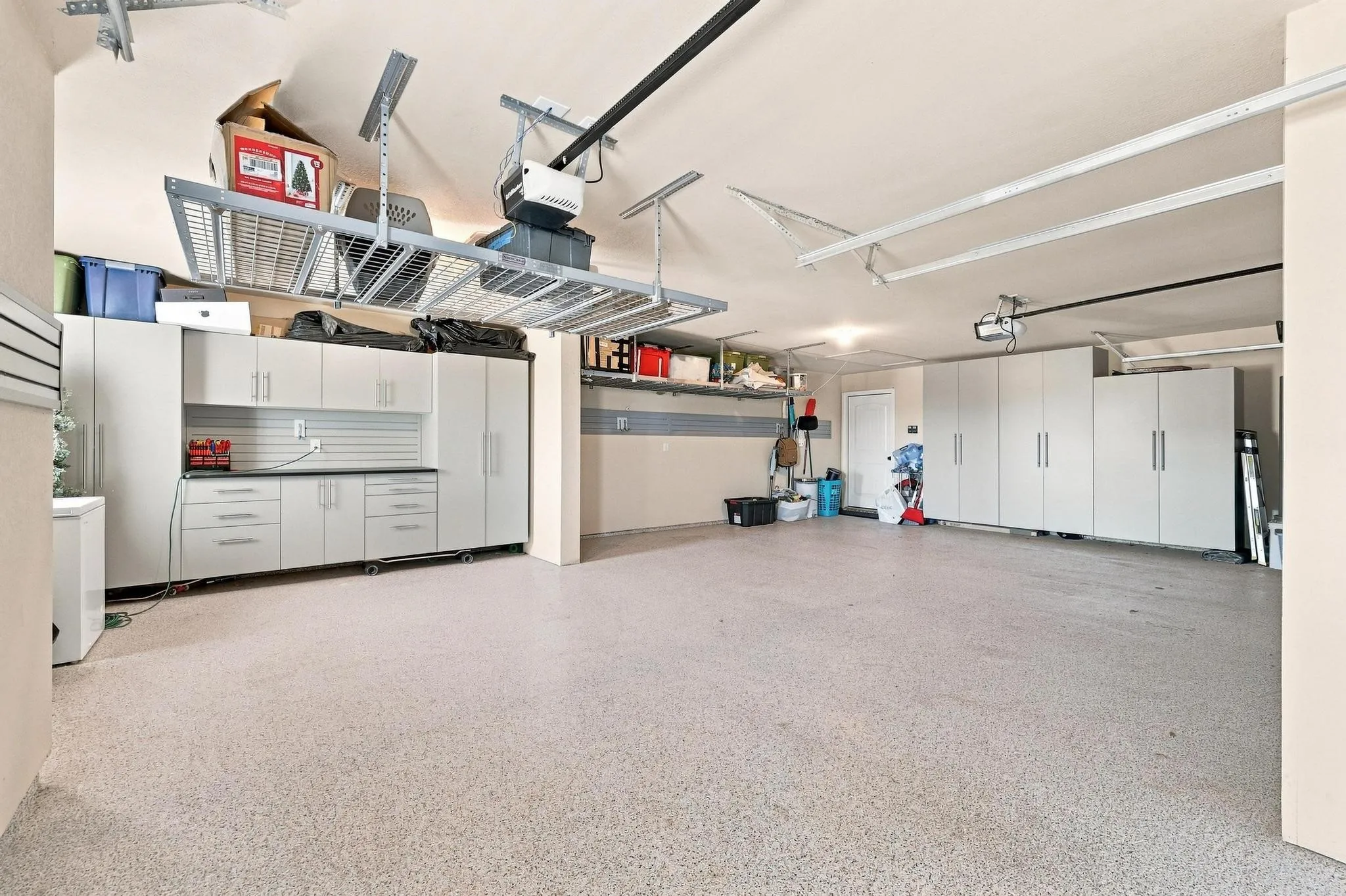 Three Car Garage, Insulated Doors, Epoxy Floors, Wurth Pro Series Garage Storage and Strong Racks.