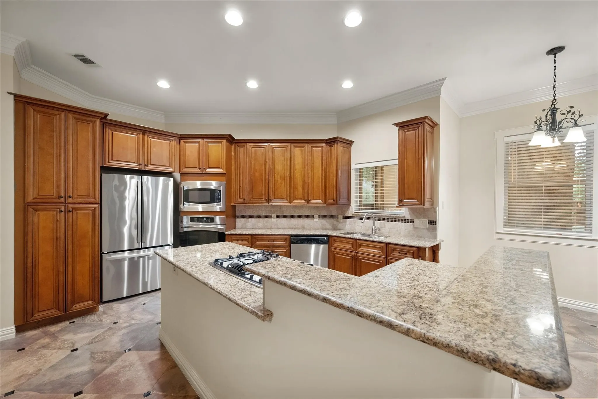 Spacious kitchen.  Includes stainless refrigerator