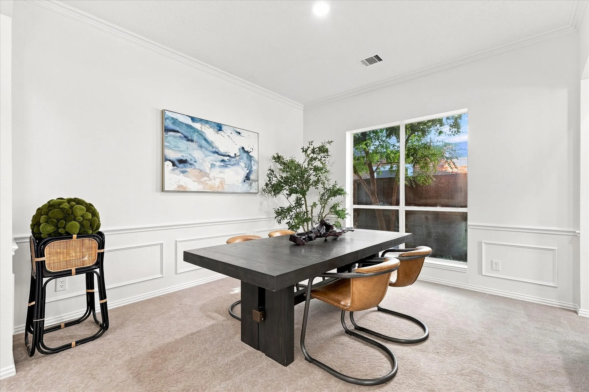 Gather around the table in this inviting dining room, with plenty of space to host dinner parties, family meals, and celebrations.