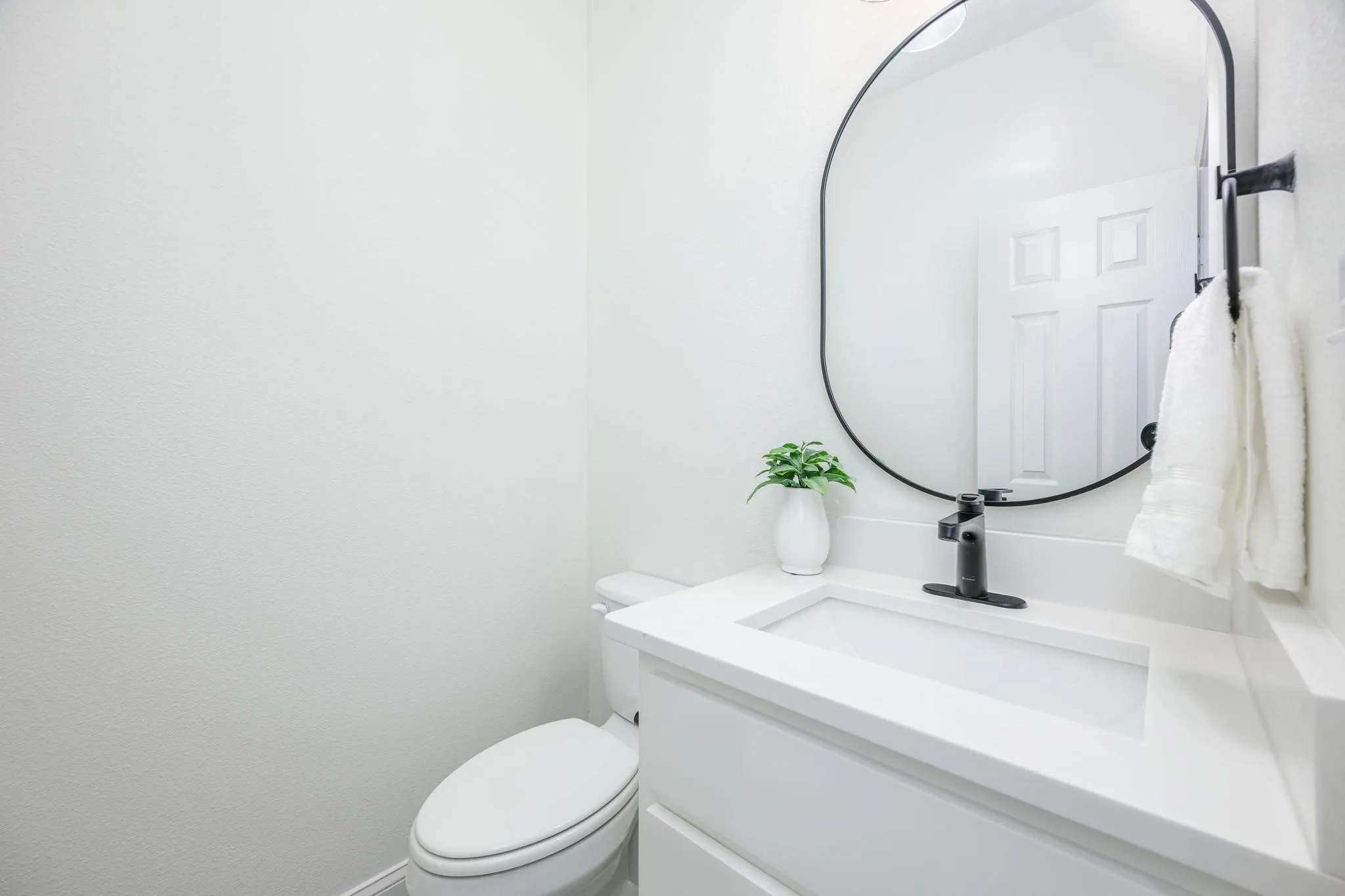 Half bath located by the garage entrance