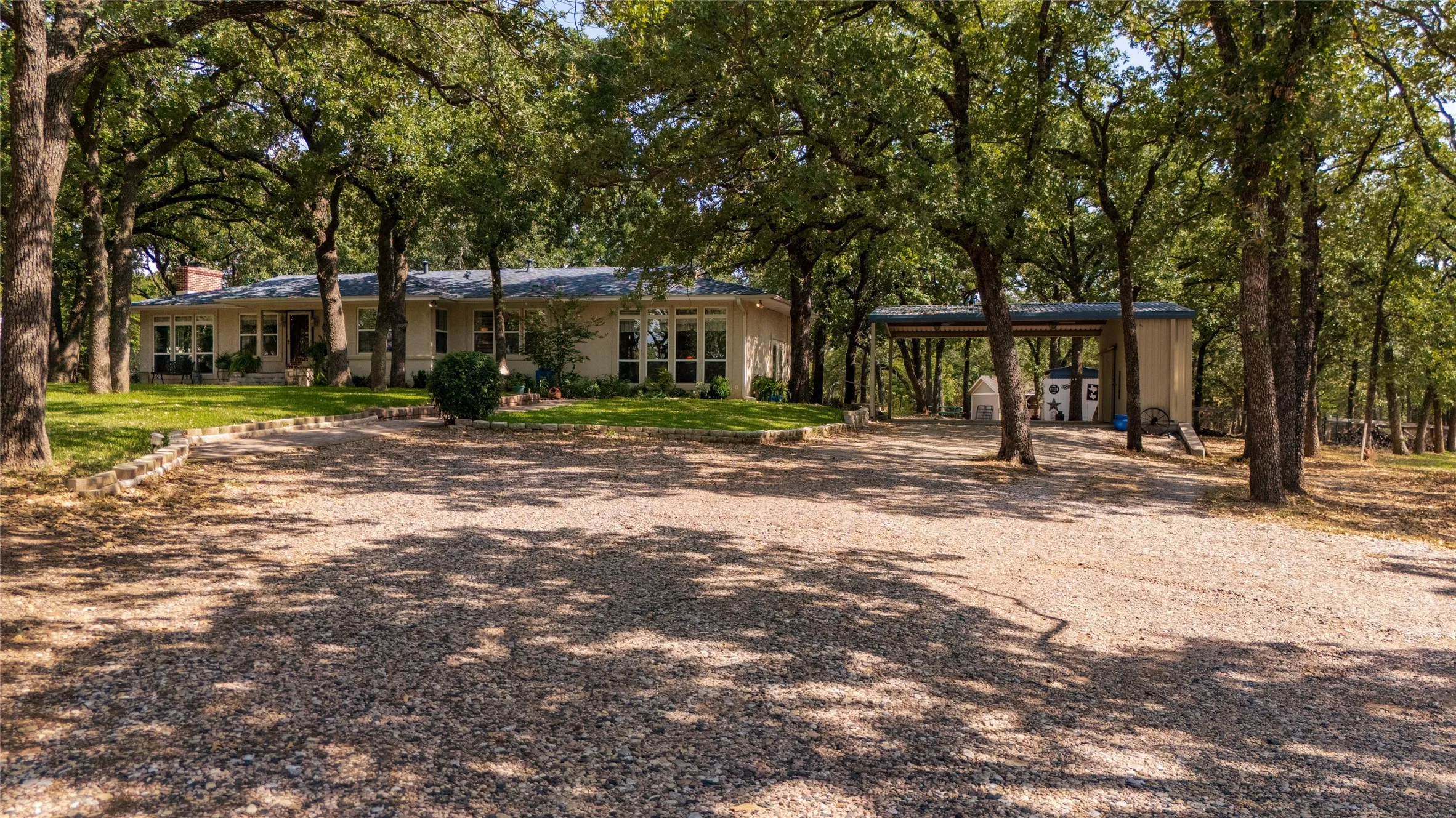 Big oak trees and a long drive. This place feels like home before you even step inside.
