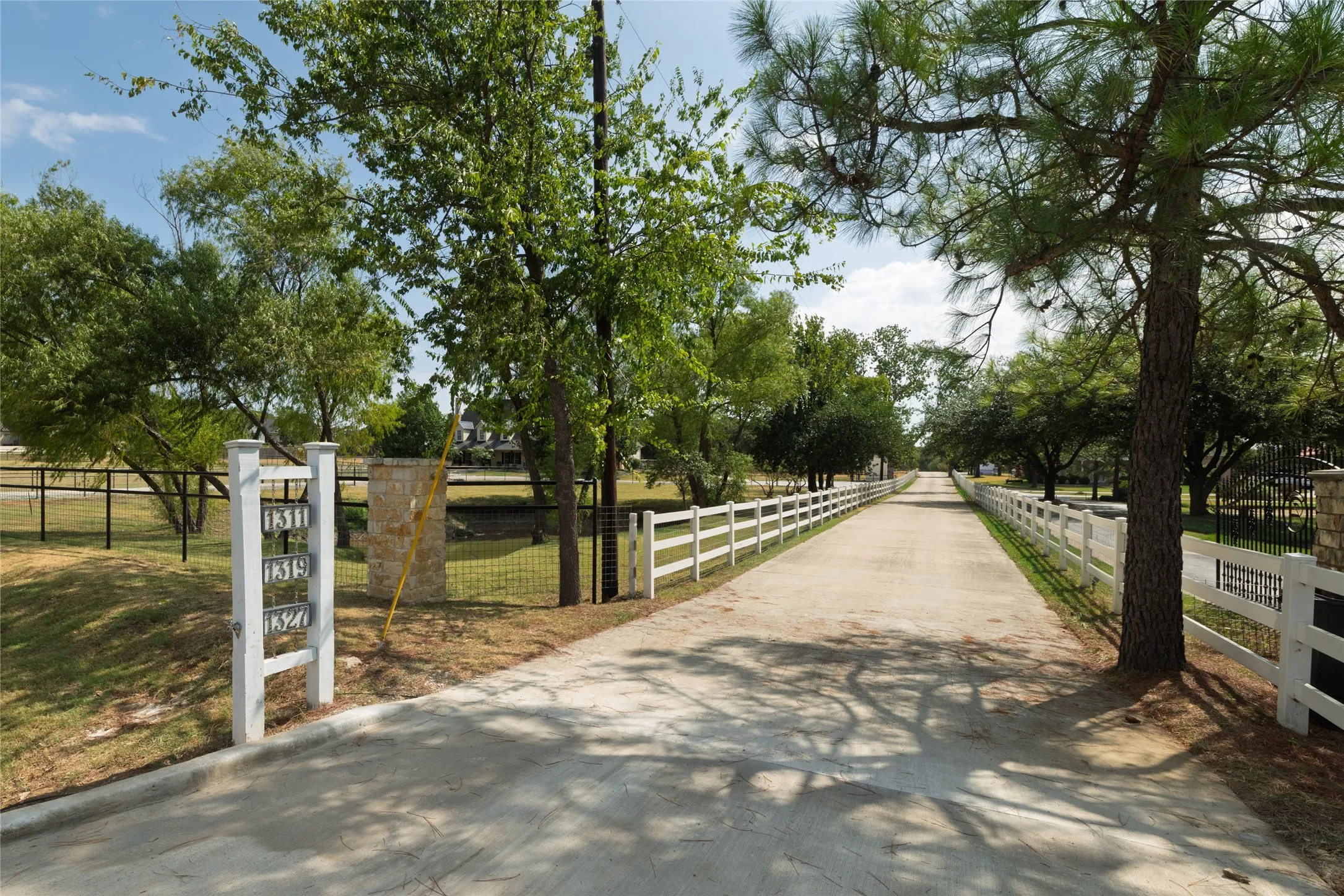 Roll up the long drive way and welcome yourself home!