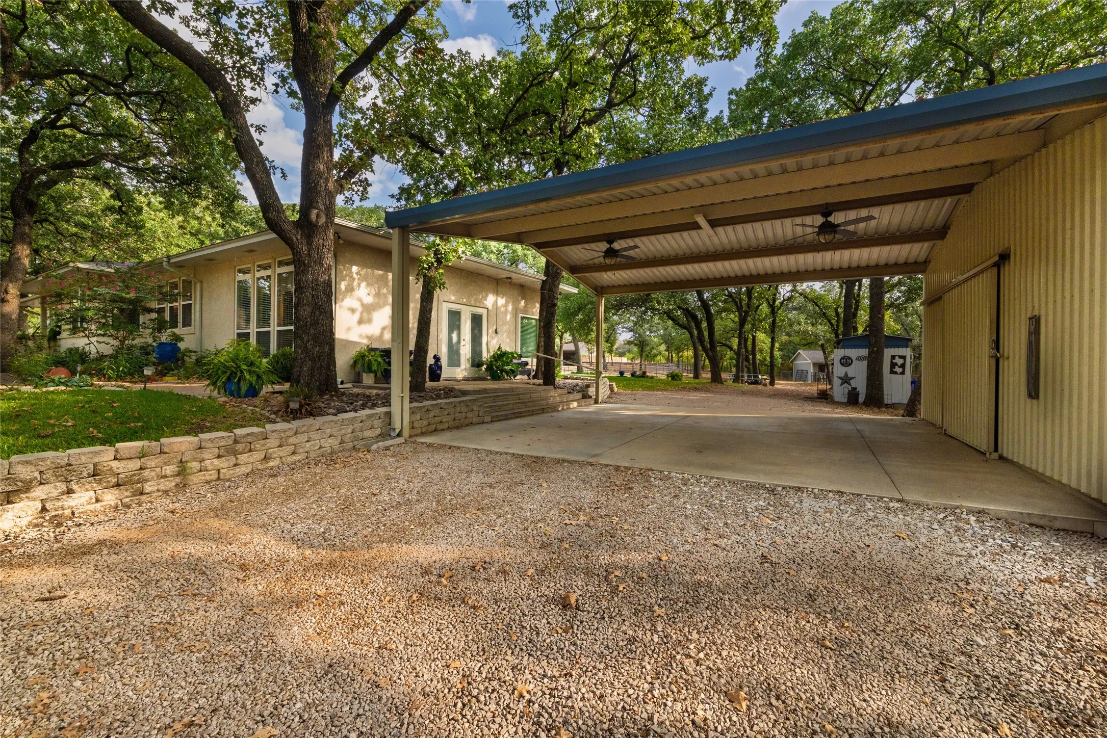 Wide open covered space, perfect for parking, projects, or parties.