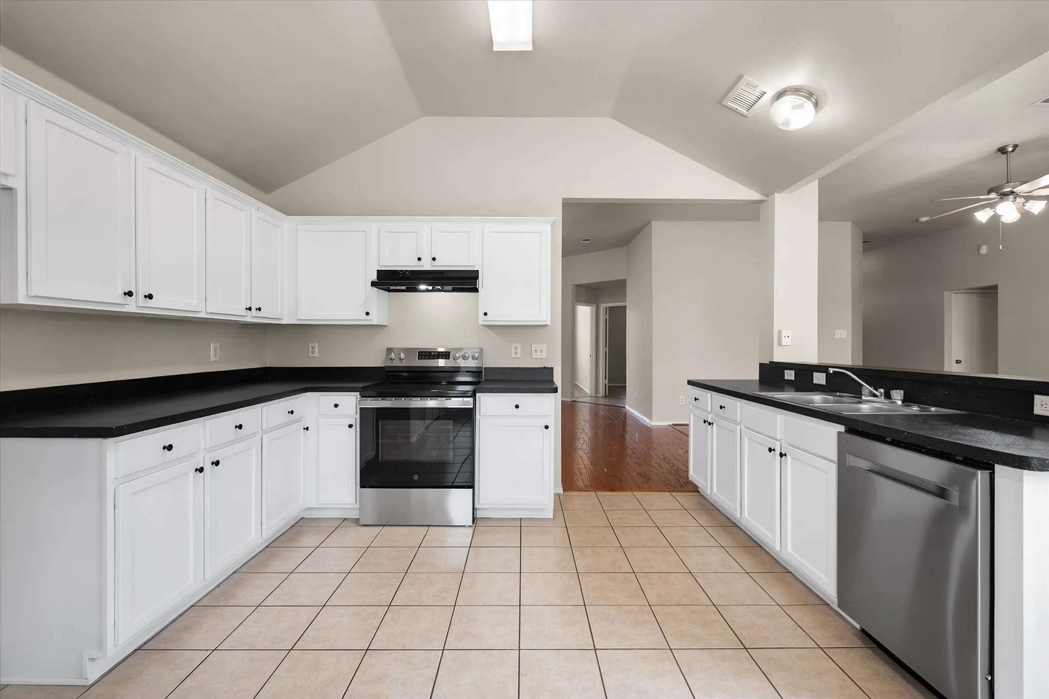 Plenty of cabinets and counter space in this kitchen