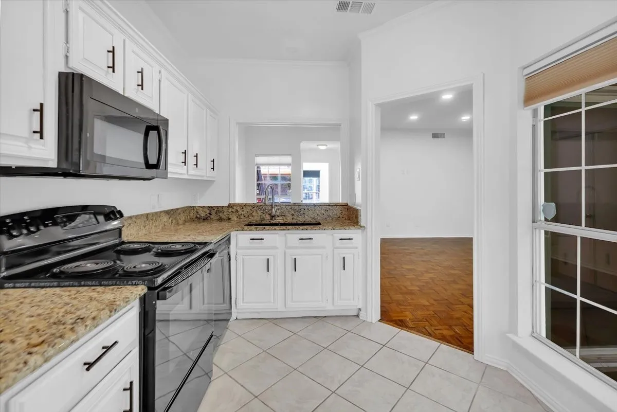 View of from kitchen into living/dining area