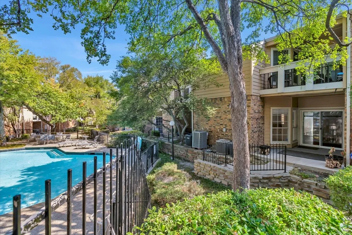 Community pool with view of patio