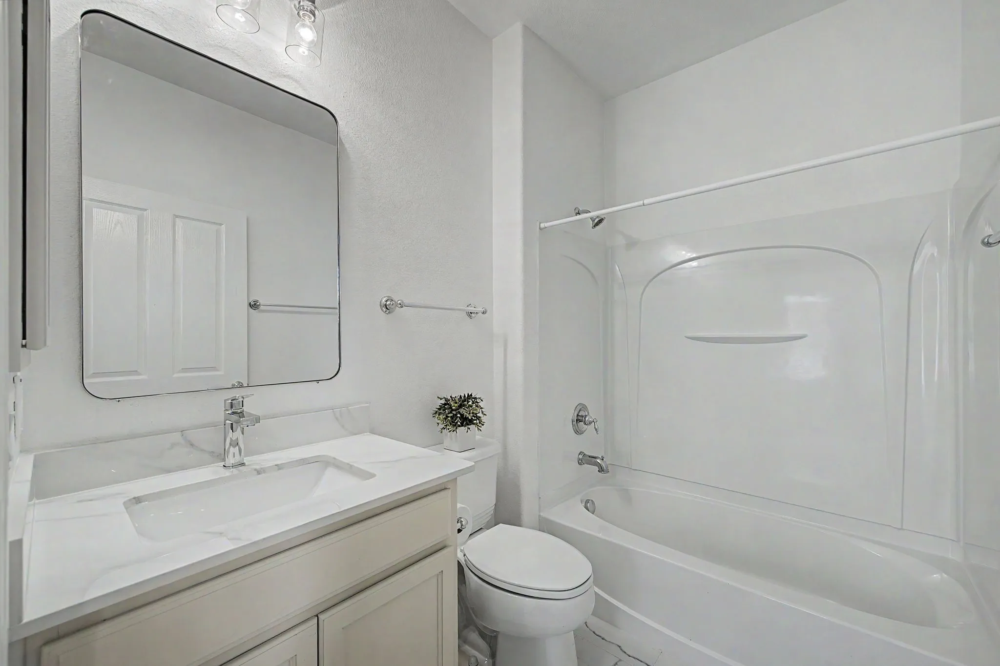 NEW quartz countertops and floor tile