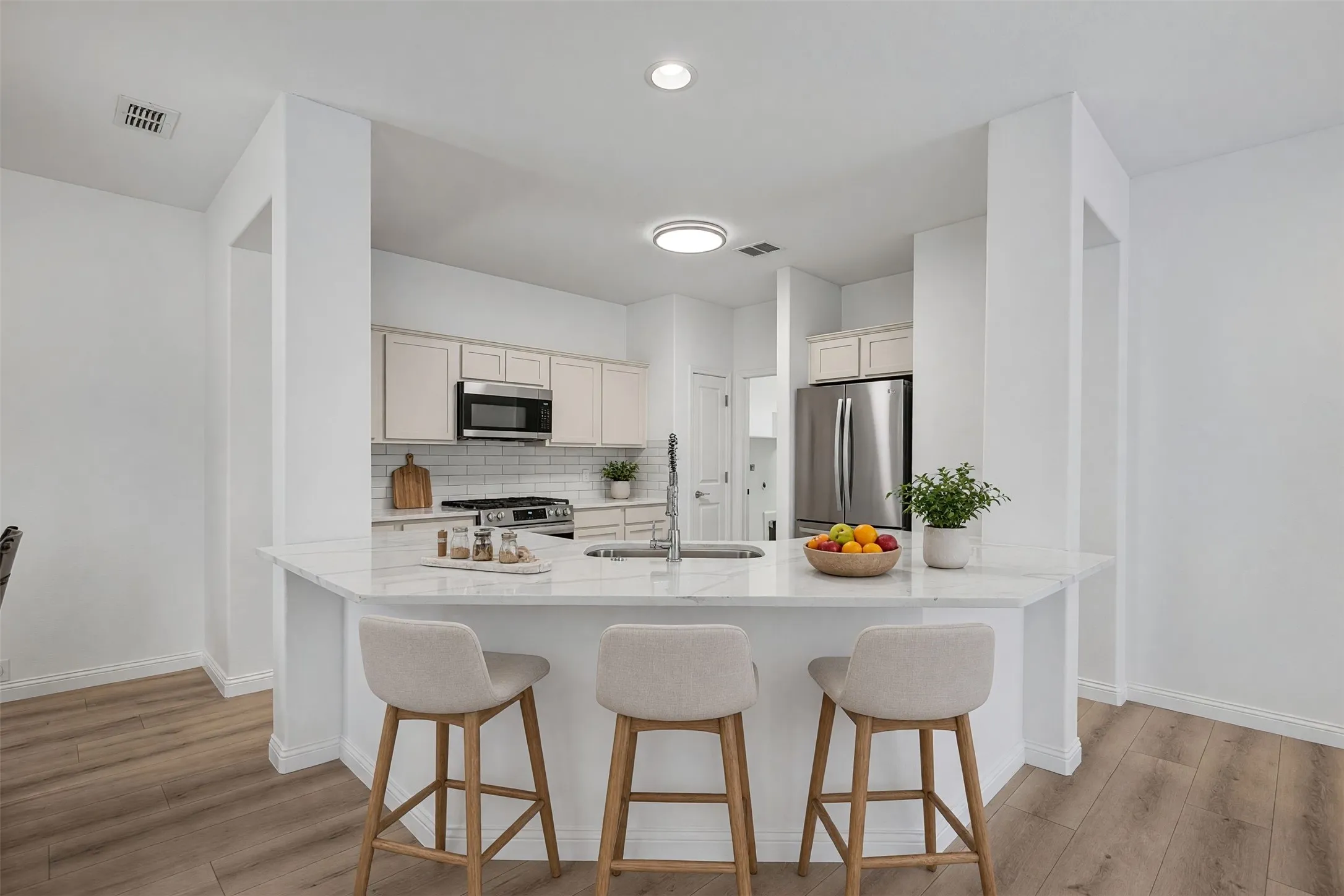 NEW quartz countertops with lowered island
