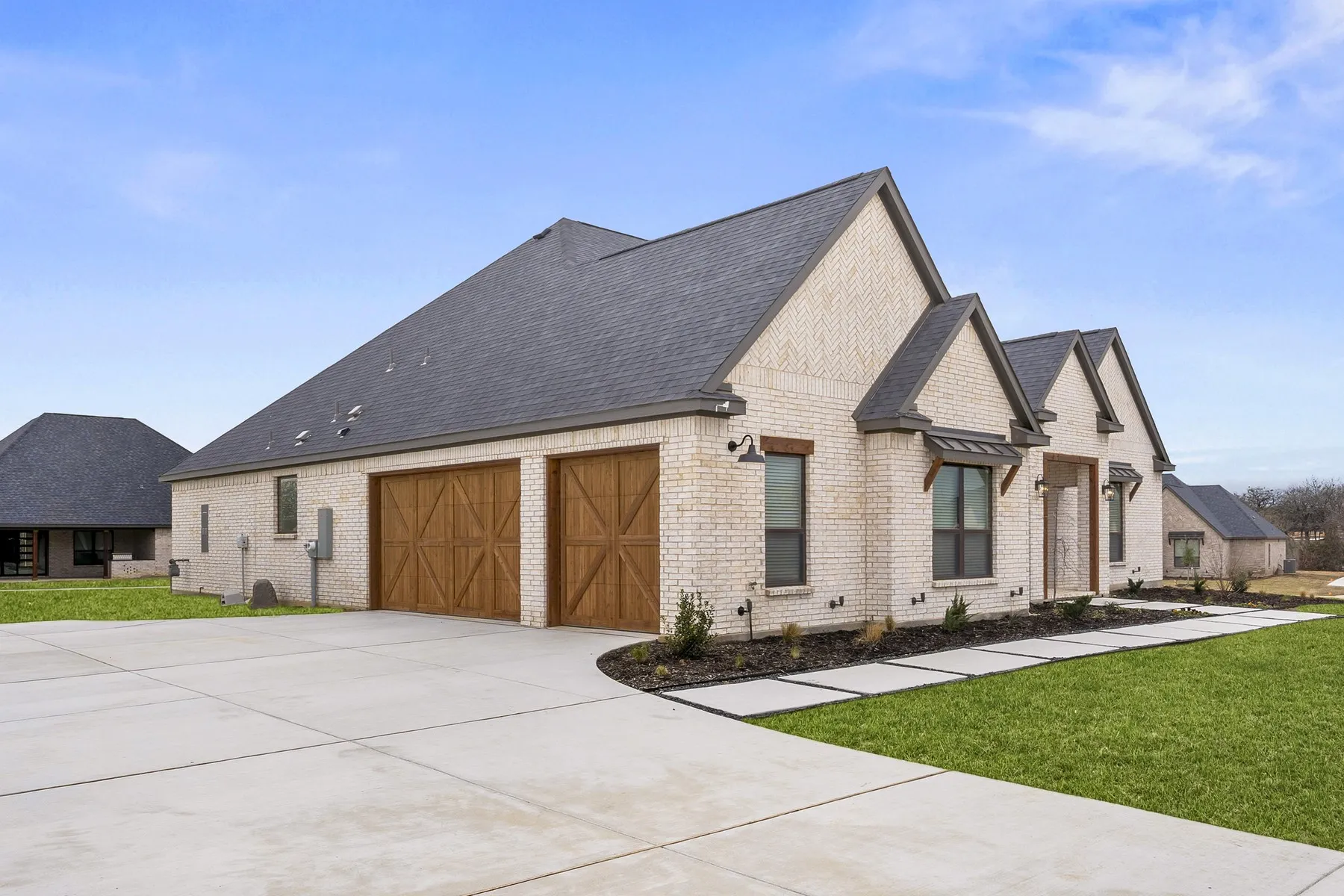 The beautiful Mantle floor plan built at 132 Willow Oak Drive with a 3-car garage.