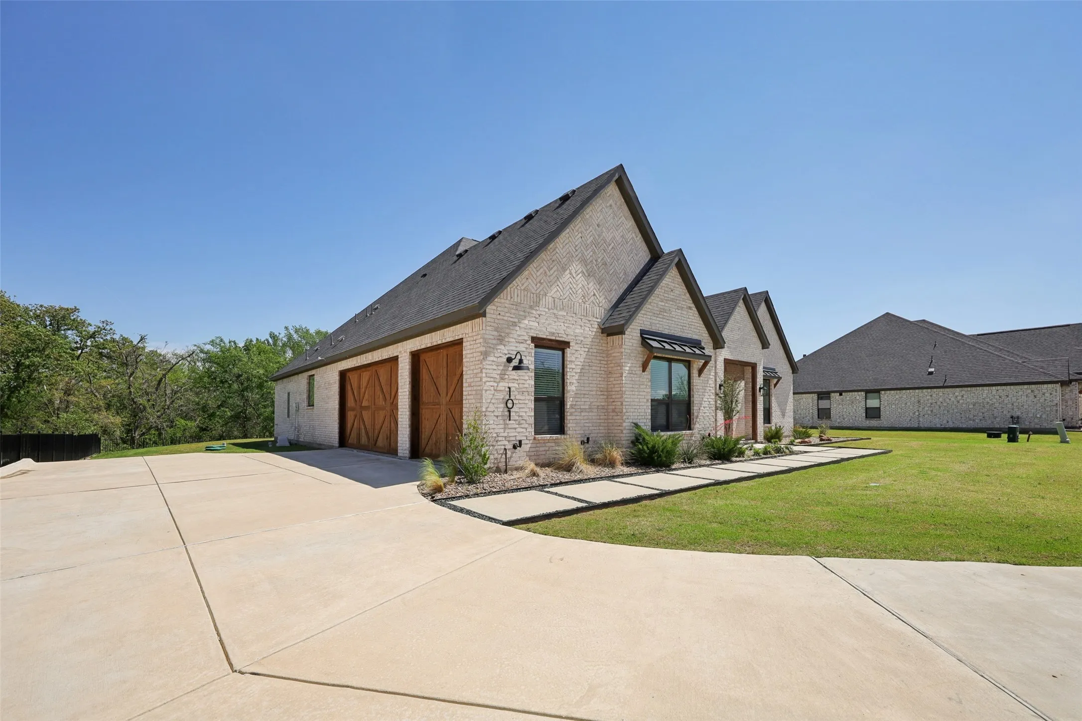 An example of the beautiful Mantle floor plan built at 132 Peachleaf Drive with a 3-car garage.