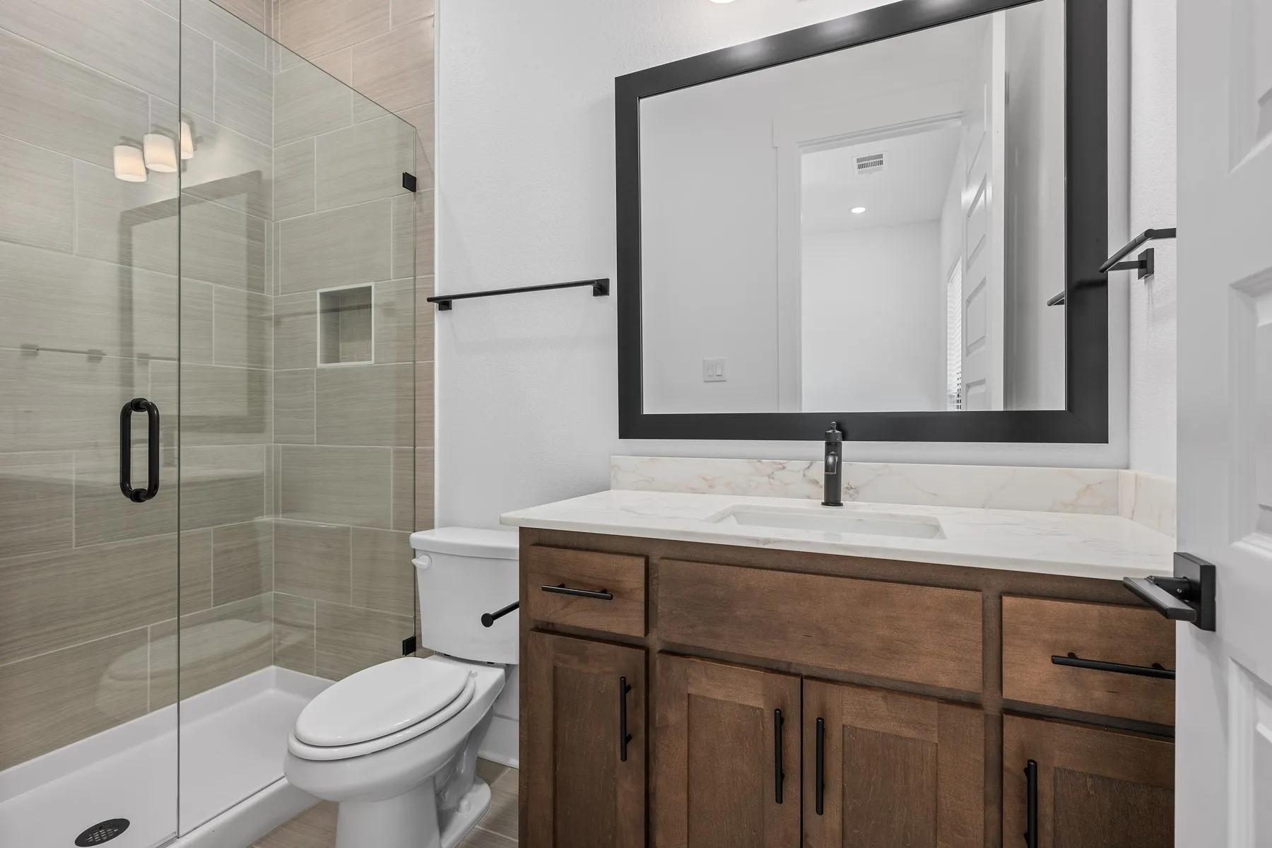 En-suite bathroom. Interior finishes and selections for this home may differ from photos shown.