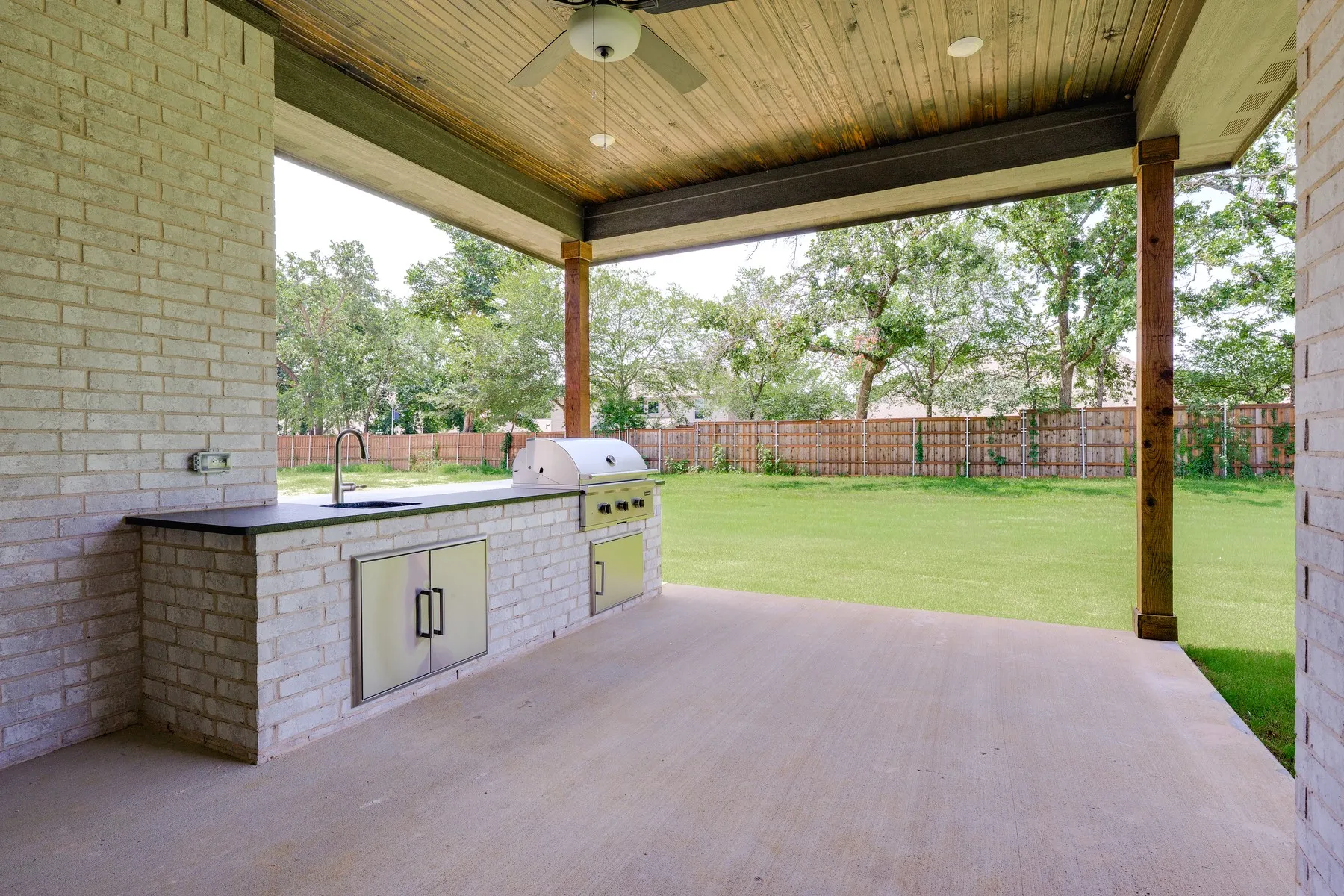 Outdoor kitchen comes standard with the home.