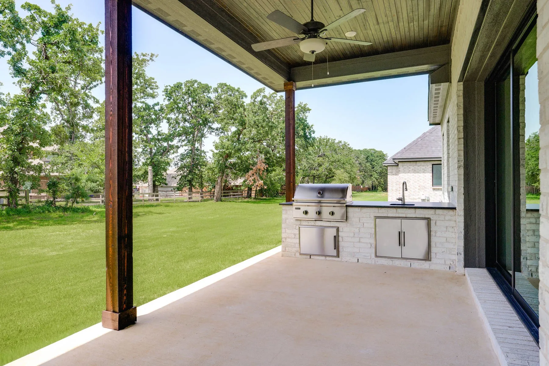 Outdoor kitchen comes standard with the home.
