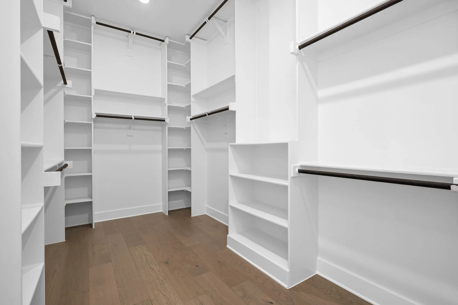 Walk-in closet in primary bedroom