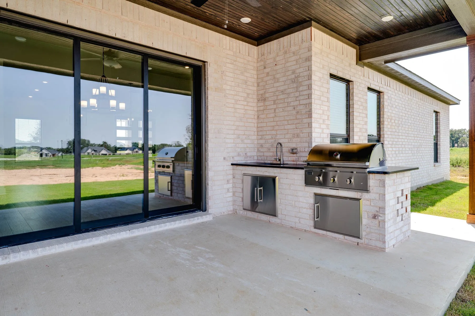 Outdoor kitchen comes standard.