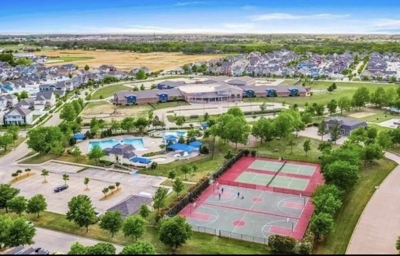Community amenities featuring multiple swimming pools, a basketball court, and tennis courts