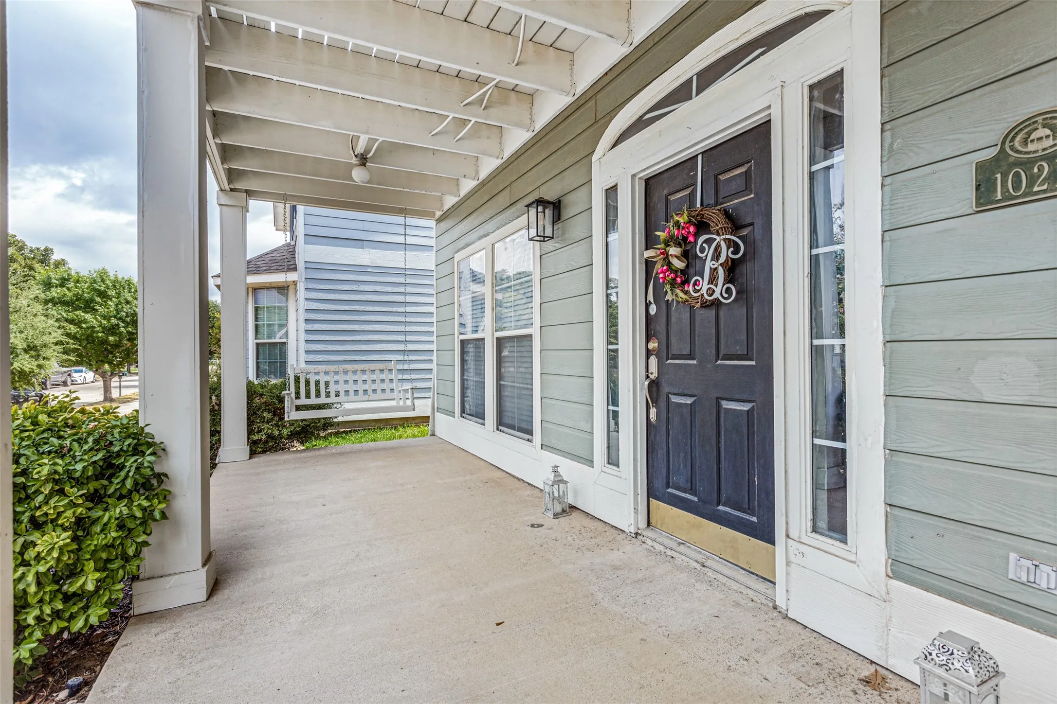 Covered front porch with space for rocking chairs
