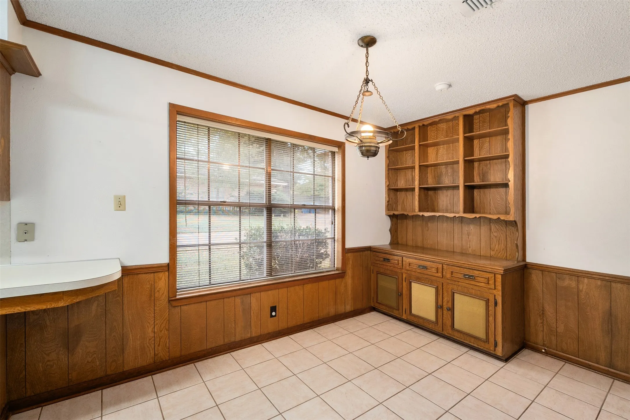 Breakfast area in kitchen with built in storage