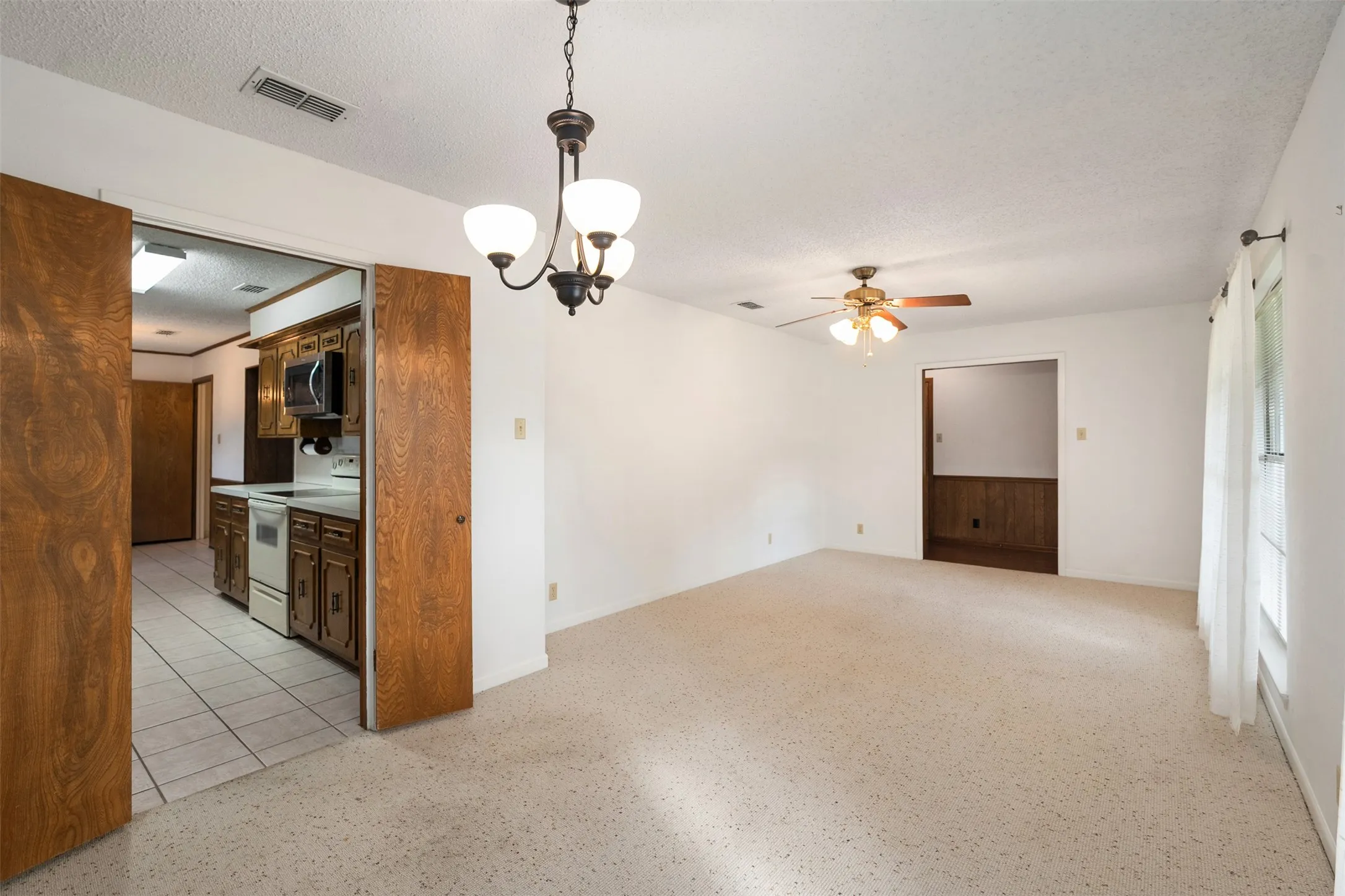 dining area with entry to kitchen