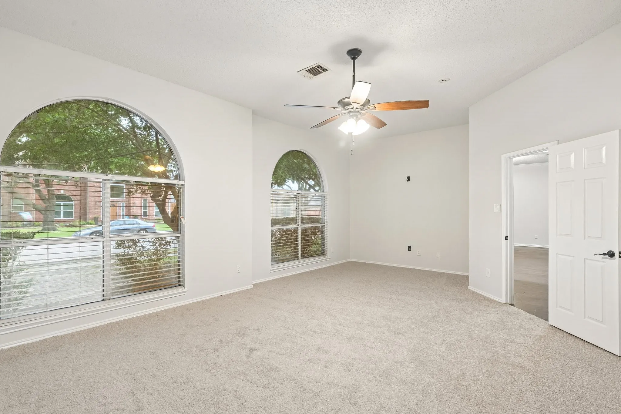 Large primary bedroom with sitting area