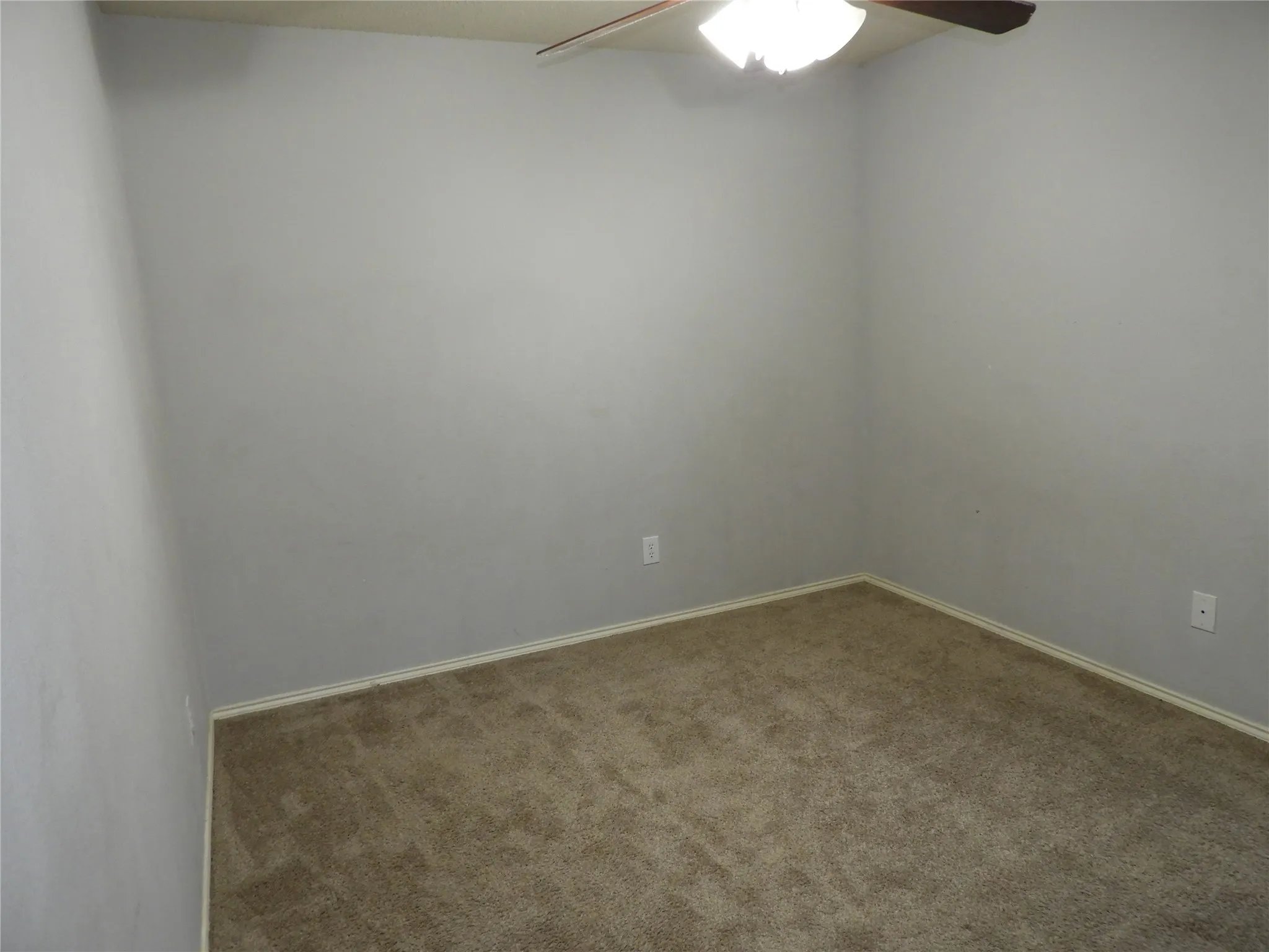 Bedroom #3 with ceiling fan.
