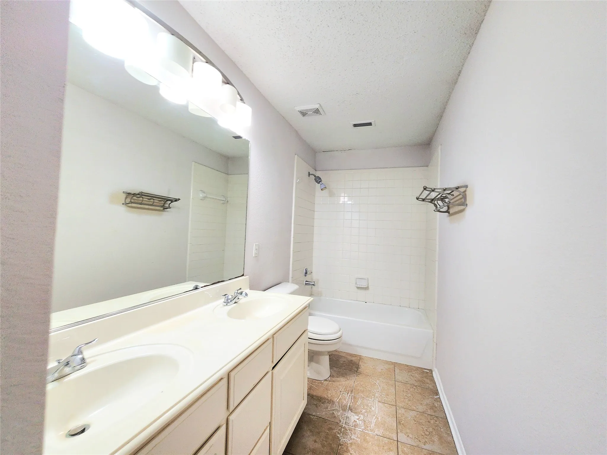 Dual vanity with integrated sinks and chrome faucets