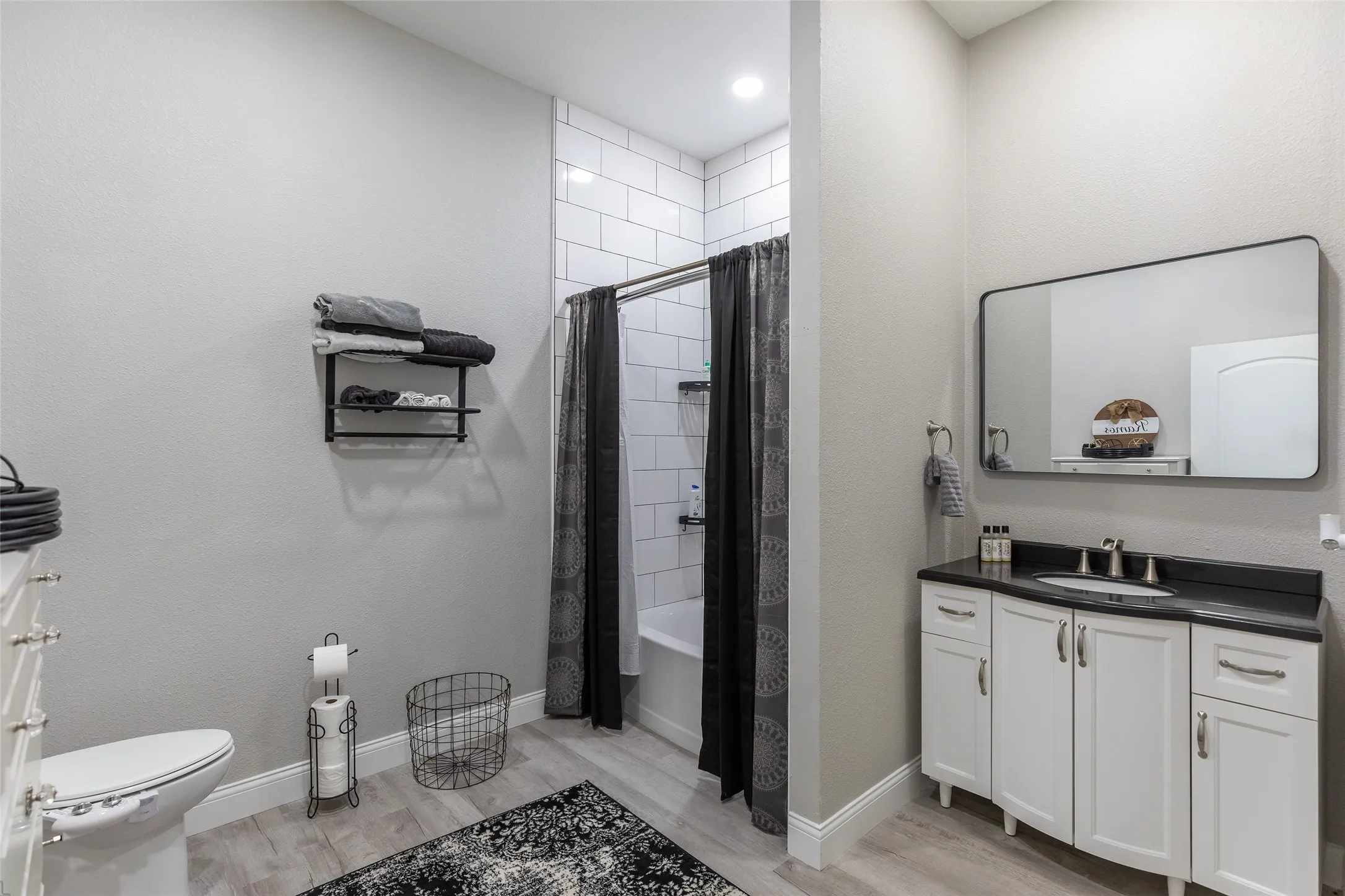 White subway tile shower surround with a built-in tub