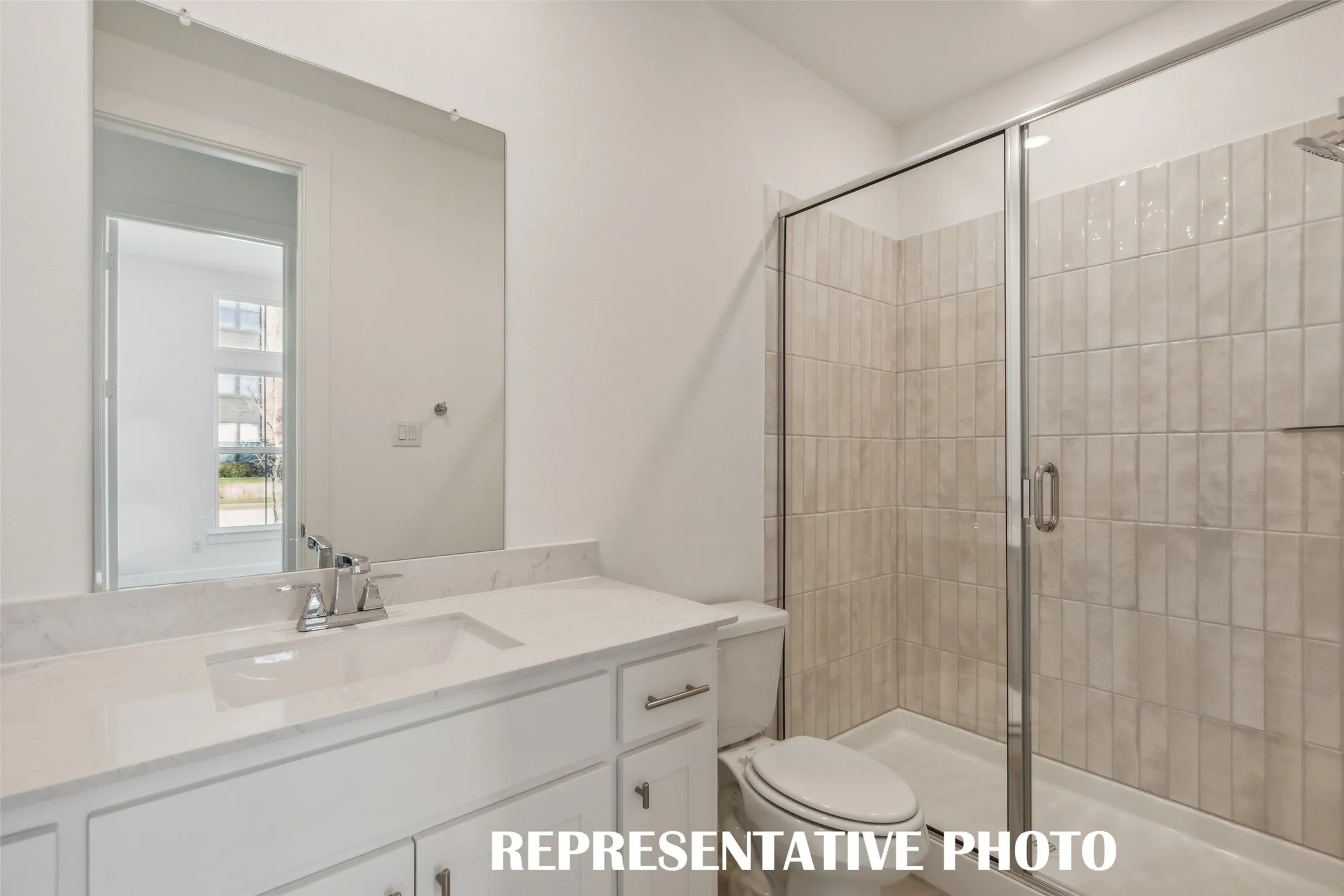 Friends and family will feel right at home in either of the beautfully finished guest baths offered in our Chapelle plan.  REPRESENTATIVE PHOTO