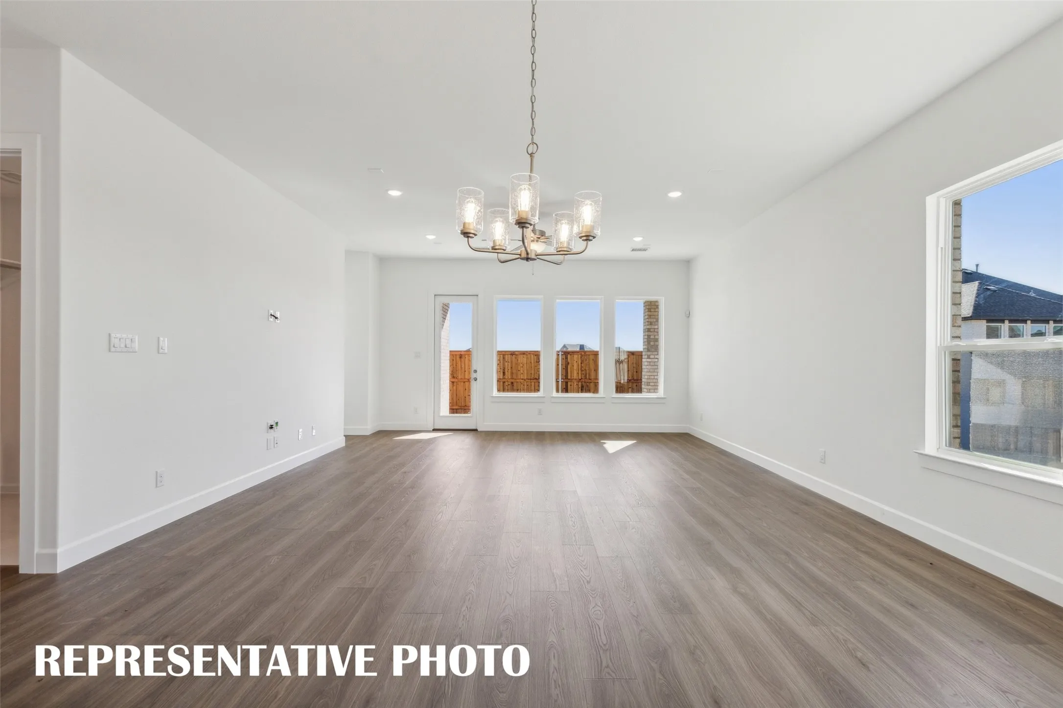 Whether it's lively dinner parties or cozy family meals, this dining room is perfect for all occasions!  REPRESENTATIVE PHOTO