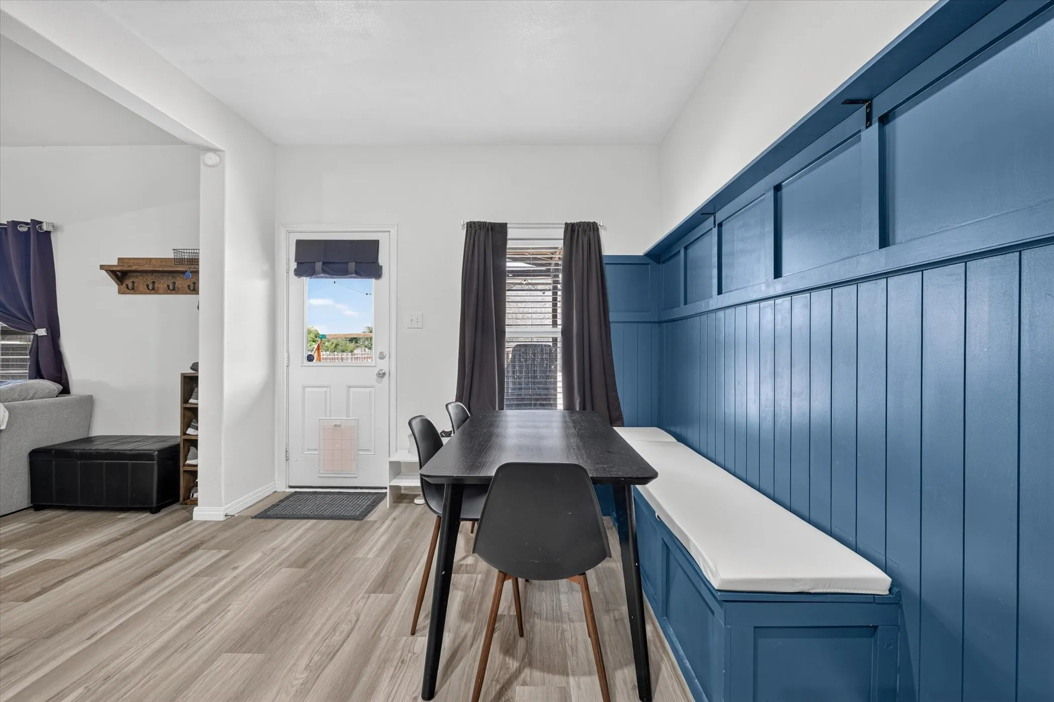 Built-in board and batten wall with integrated bench seating