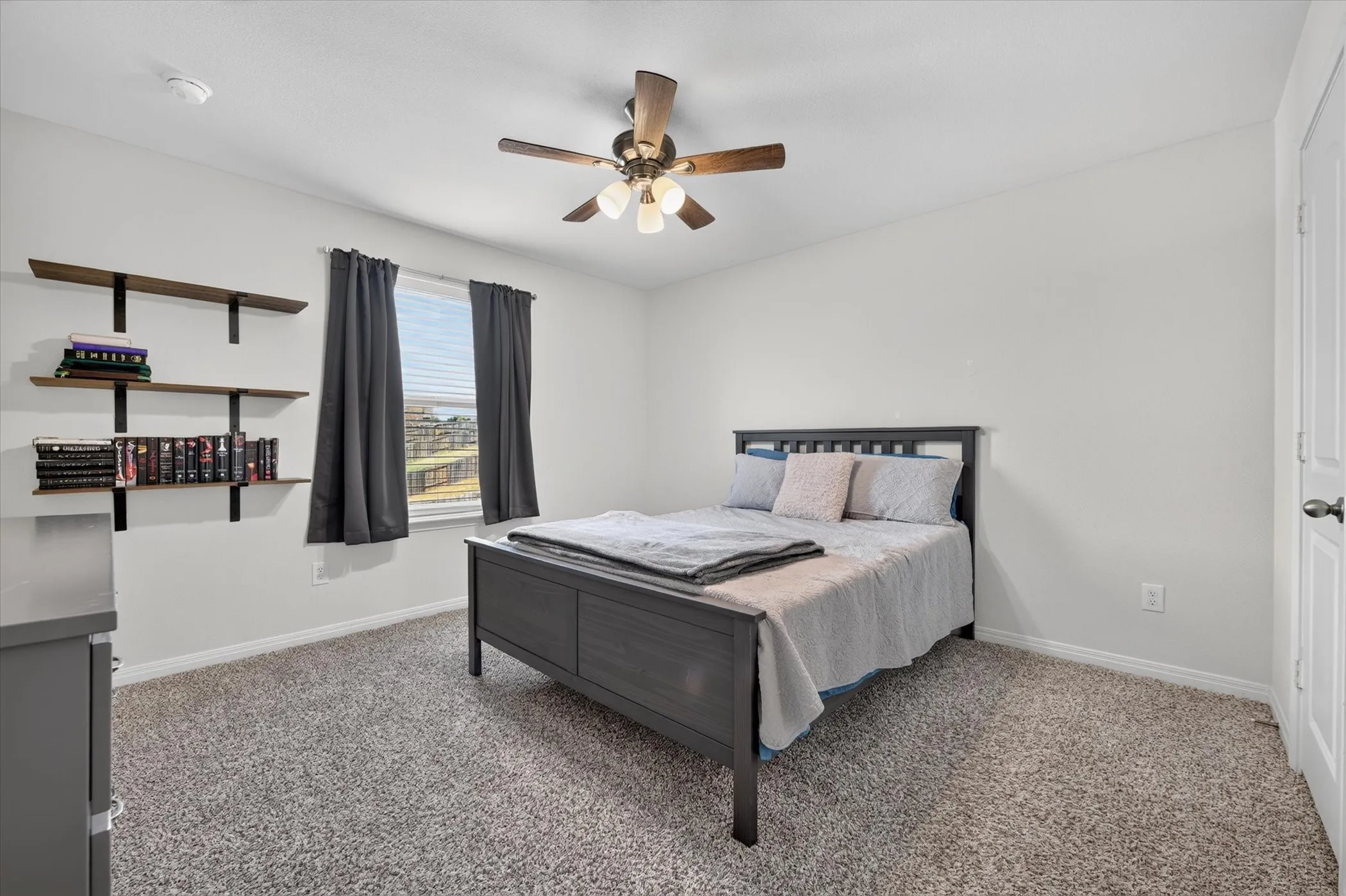 White painted walls with carpeted flooring