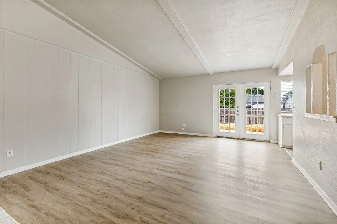 New wood, laminate flooring, and fresh paint ready for your furniture