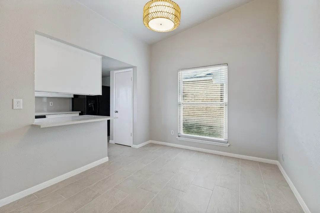 Designer Tile Flooring with a splash of Boho lighting