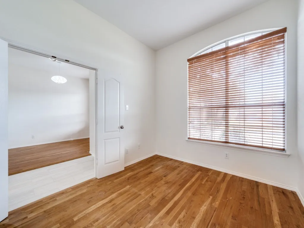 Separate office space with french doors for privacy.