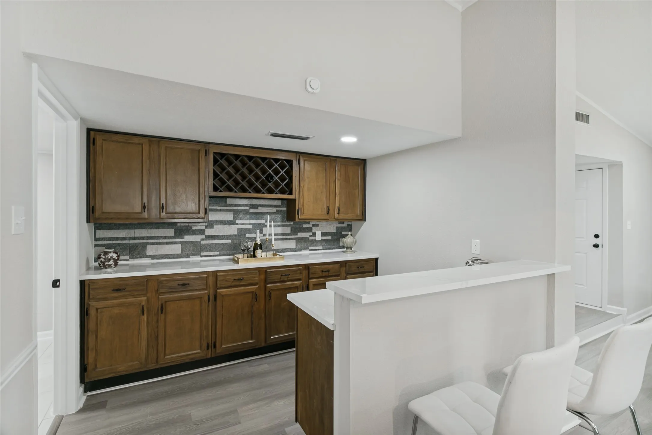 opens to kitchen and dining